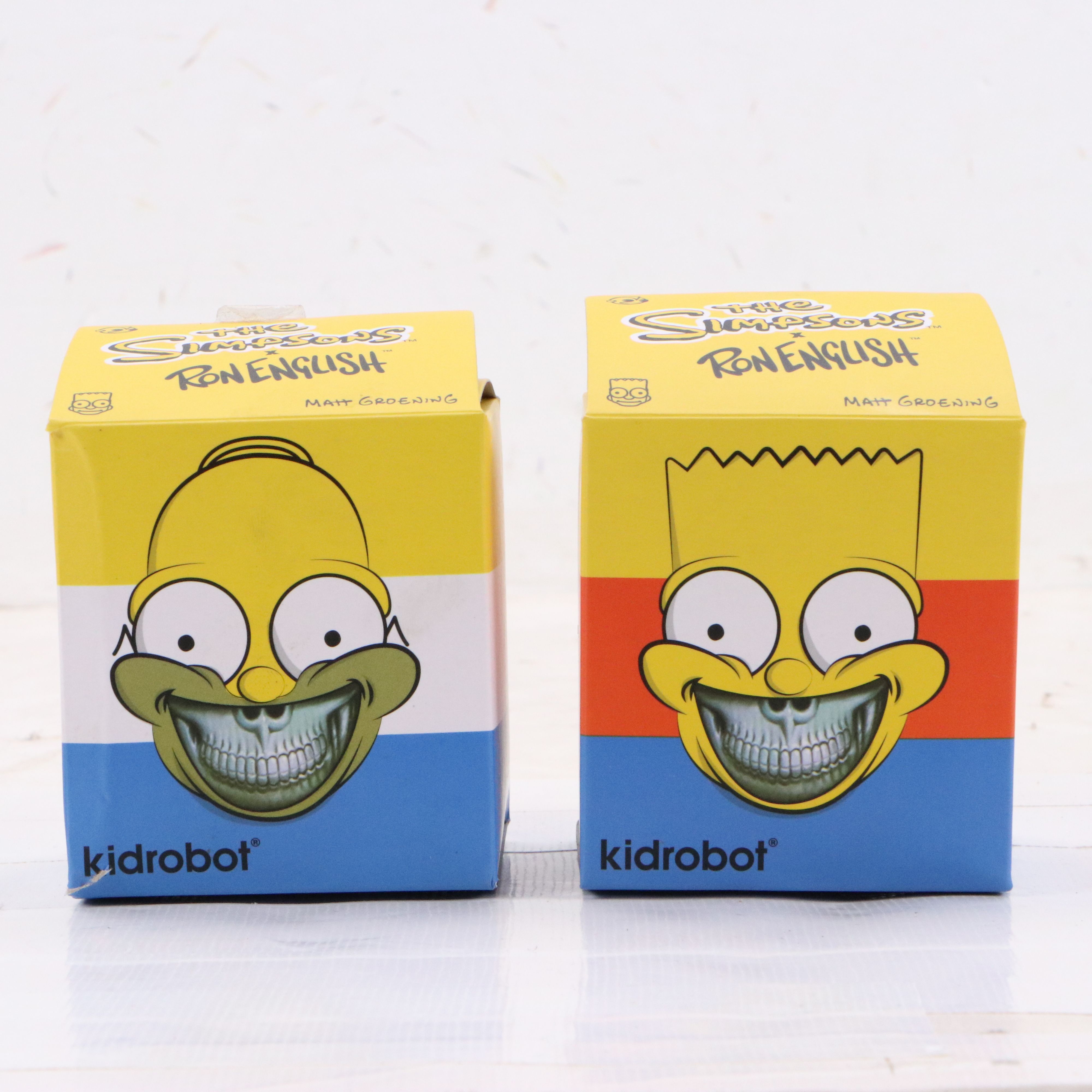 "The Simpsons x Ron English" Grinning Bart and Homer Boxed Figurines, 2015