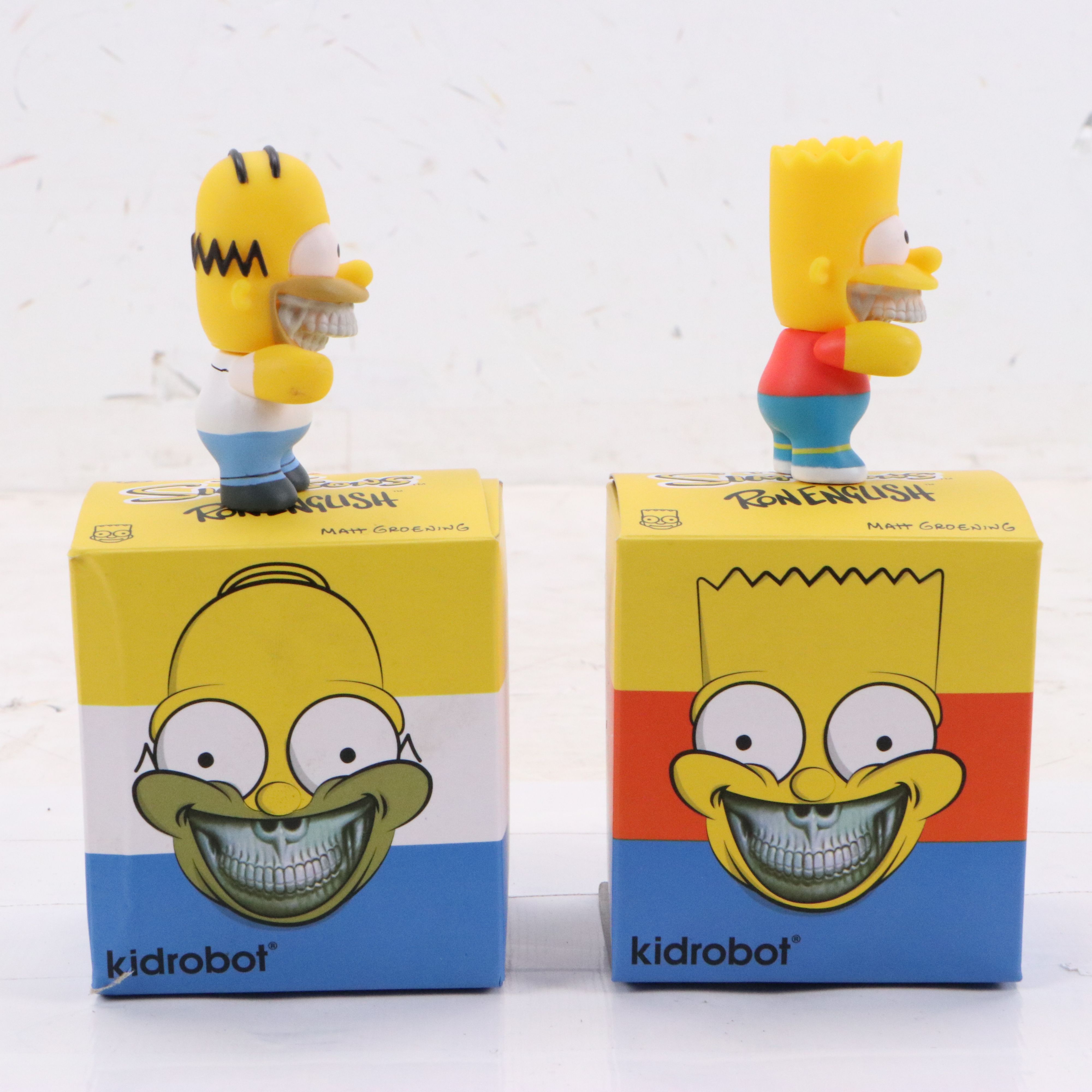 "The Simpsons x Ron English" Grinning Bart and Homer Boxed Figurines, 2015