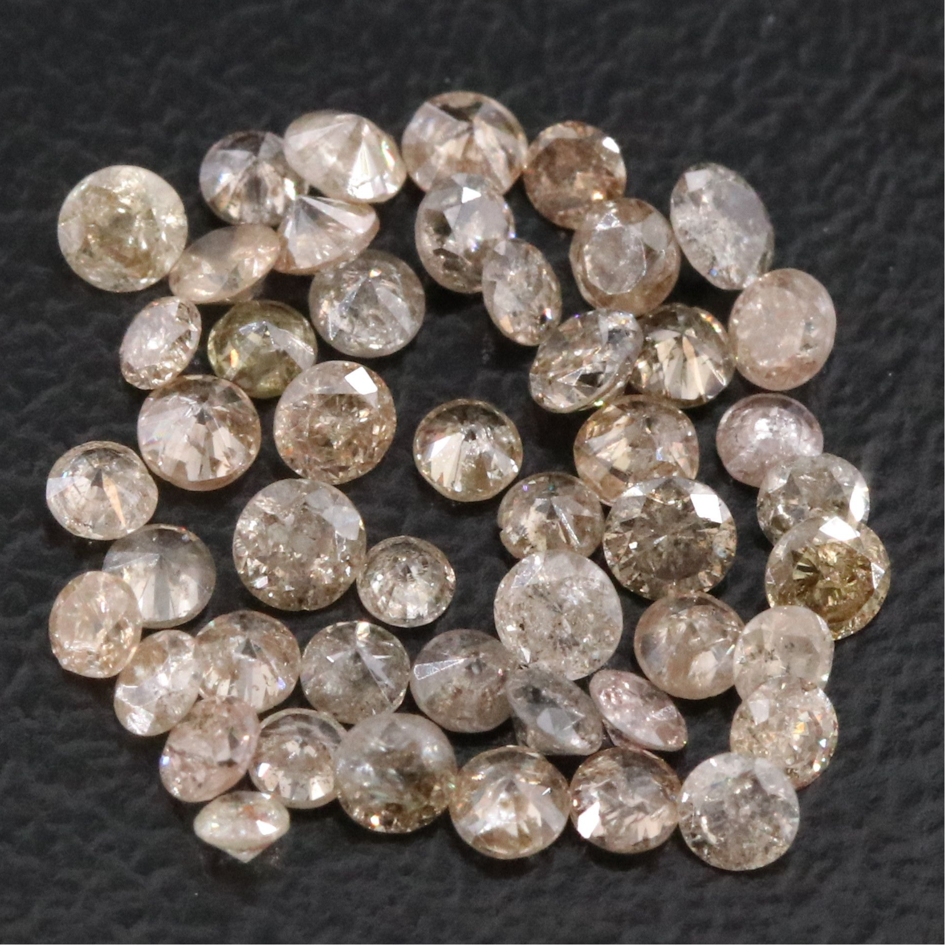 Loose 1.60 CTW Diamond Lot Including Fancy Brown