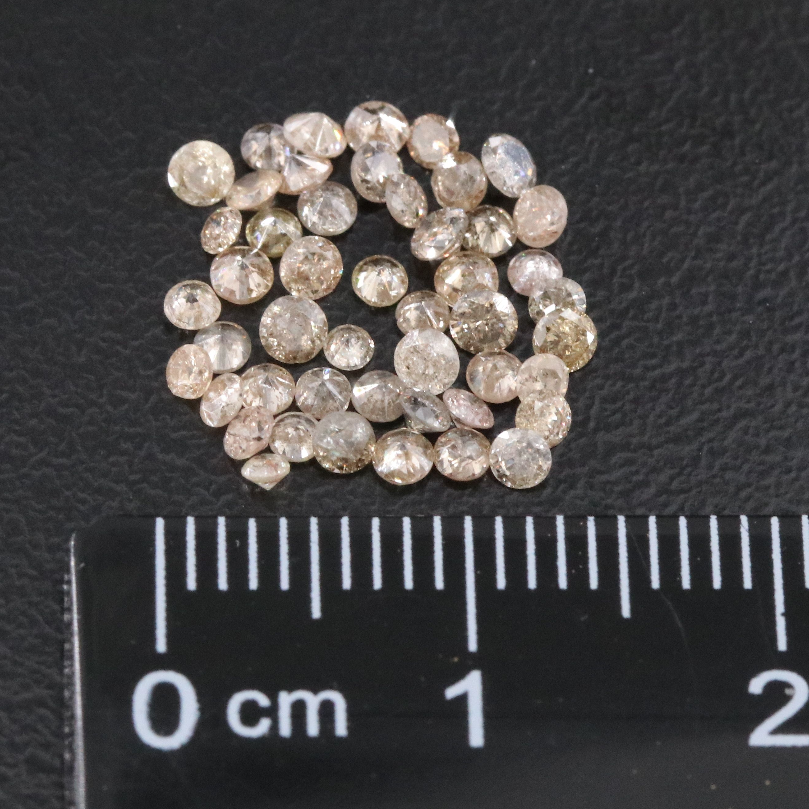 Loose 1.60 CTW Diamond Lot Including Fancy Brown