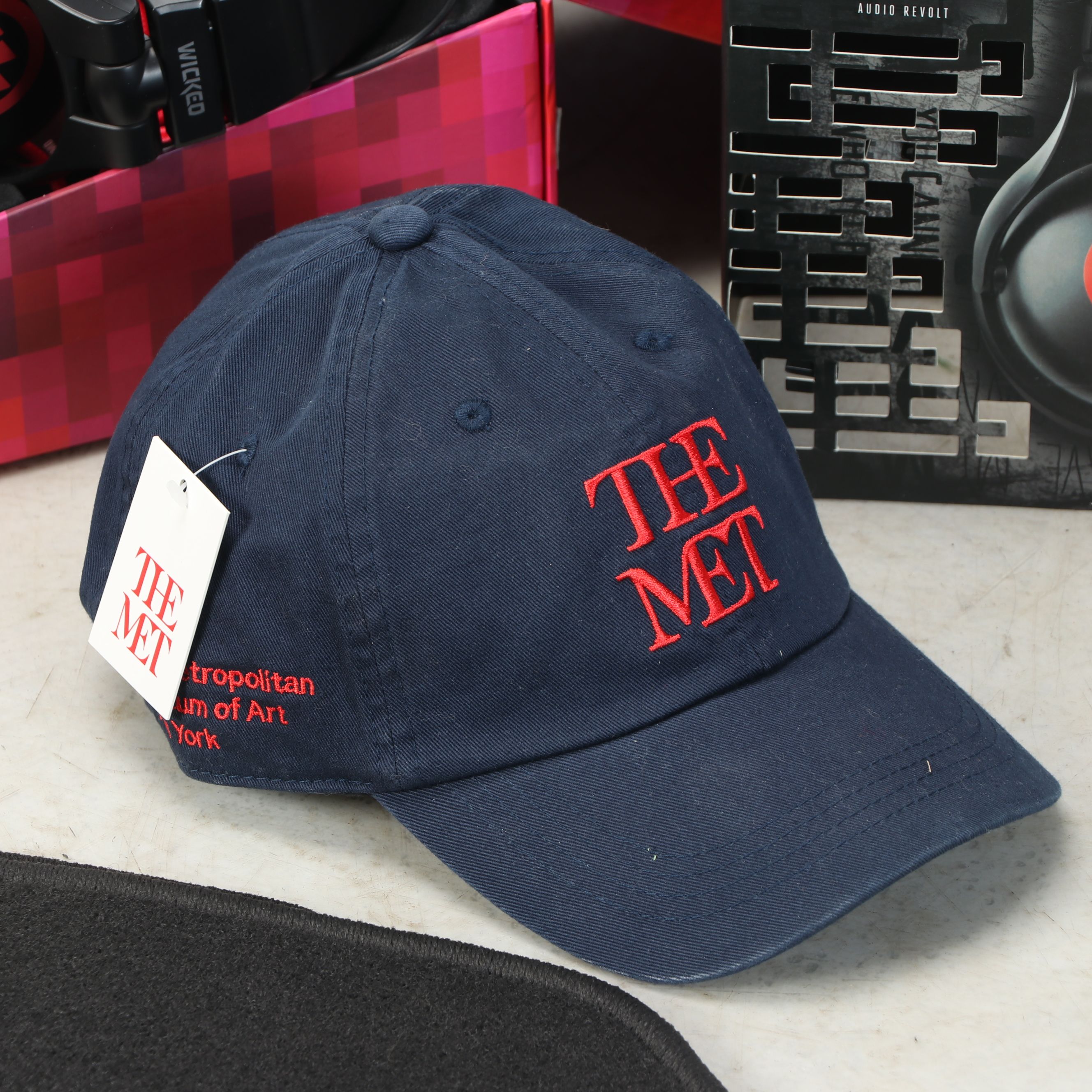 Wicked Audio Solus Headphones, The Met Baseball Cap, and More Décor