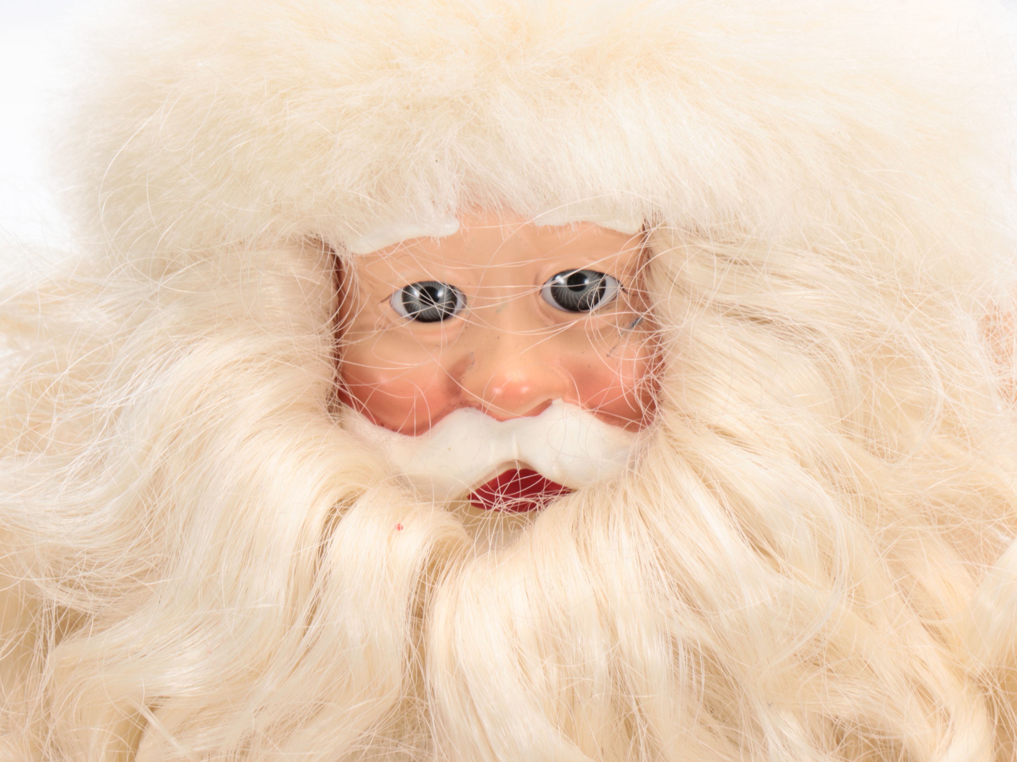 Faux Miniature Trees, Santa Claus Figurines, and More Christmas Décor