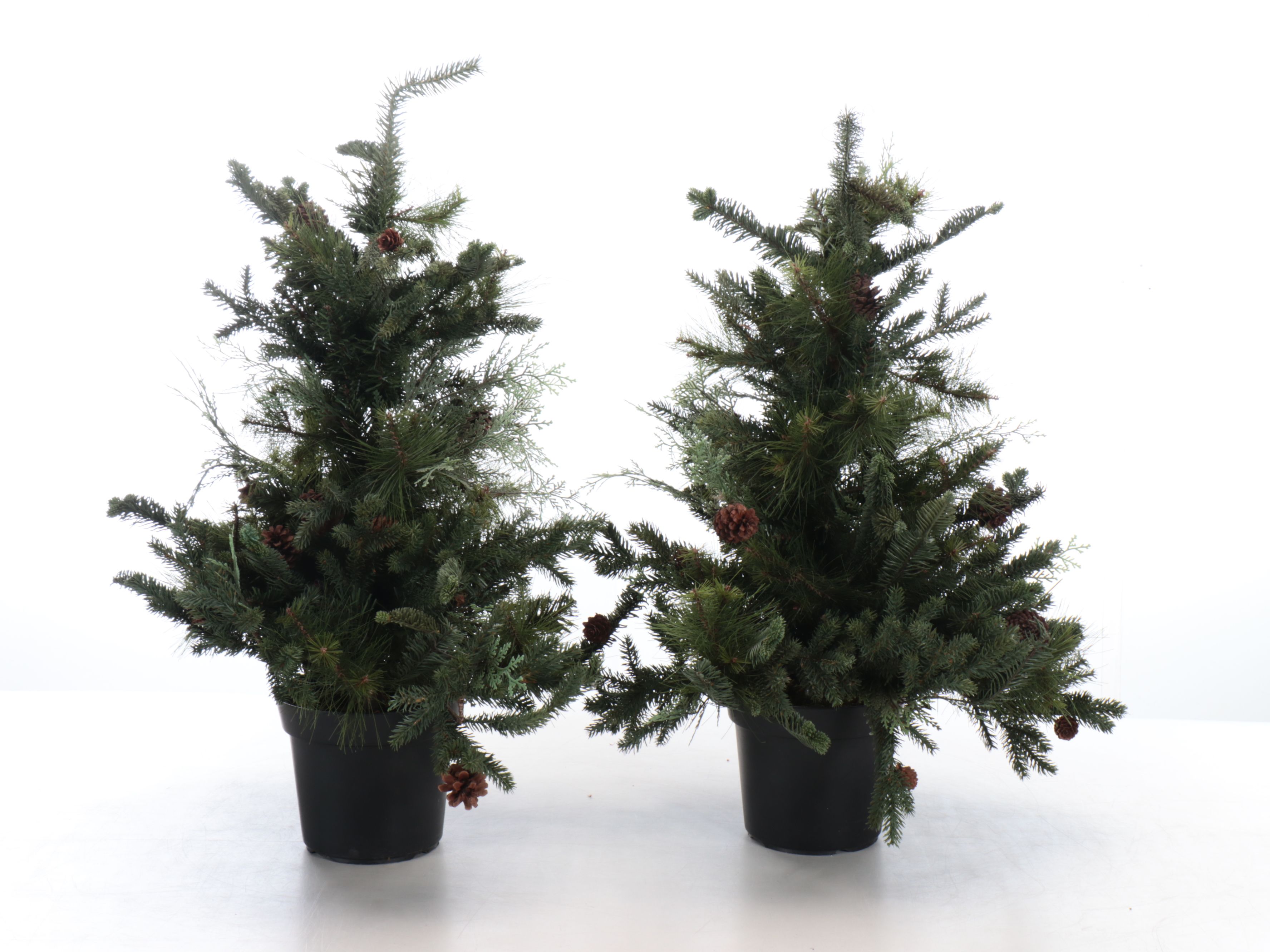 Faux Miniature Trees, Santa Claus Figurines, and More Christmas Décor