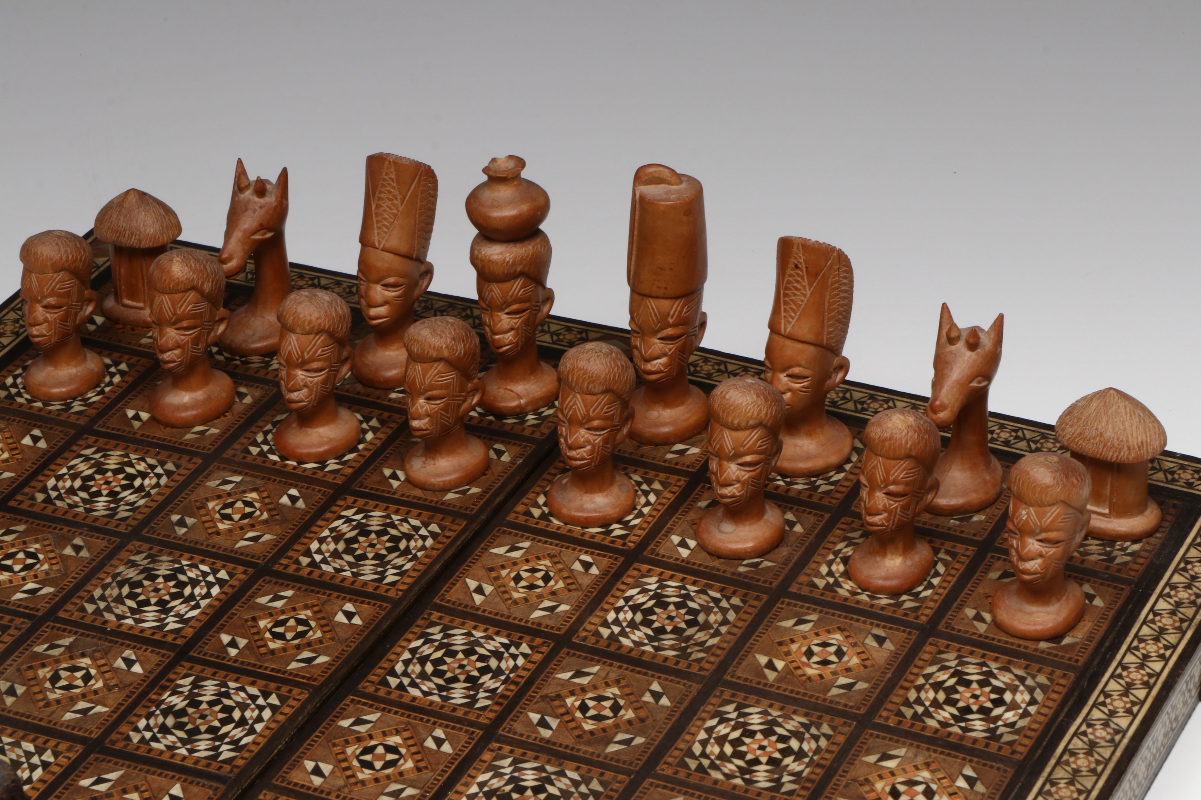 Middle Eastern Wood with Bone Inlay Chessboard with Makonde Chess Pieces