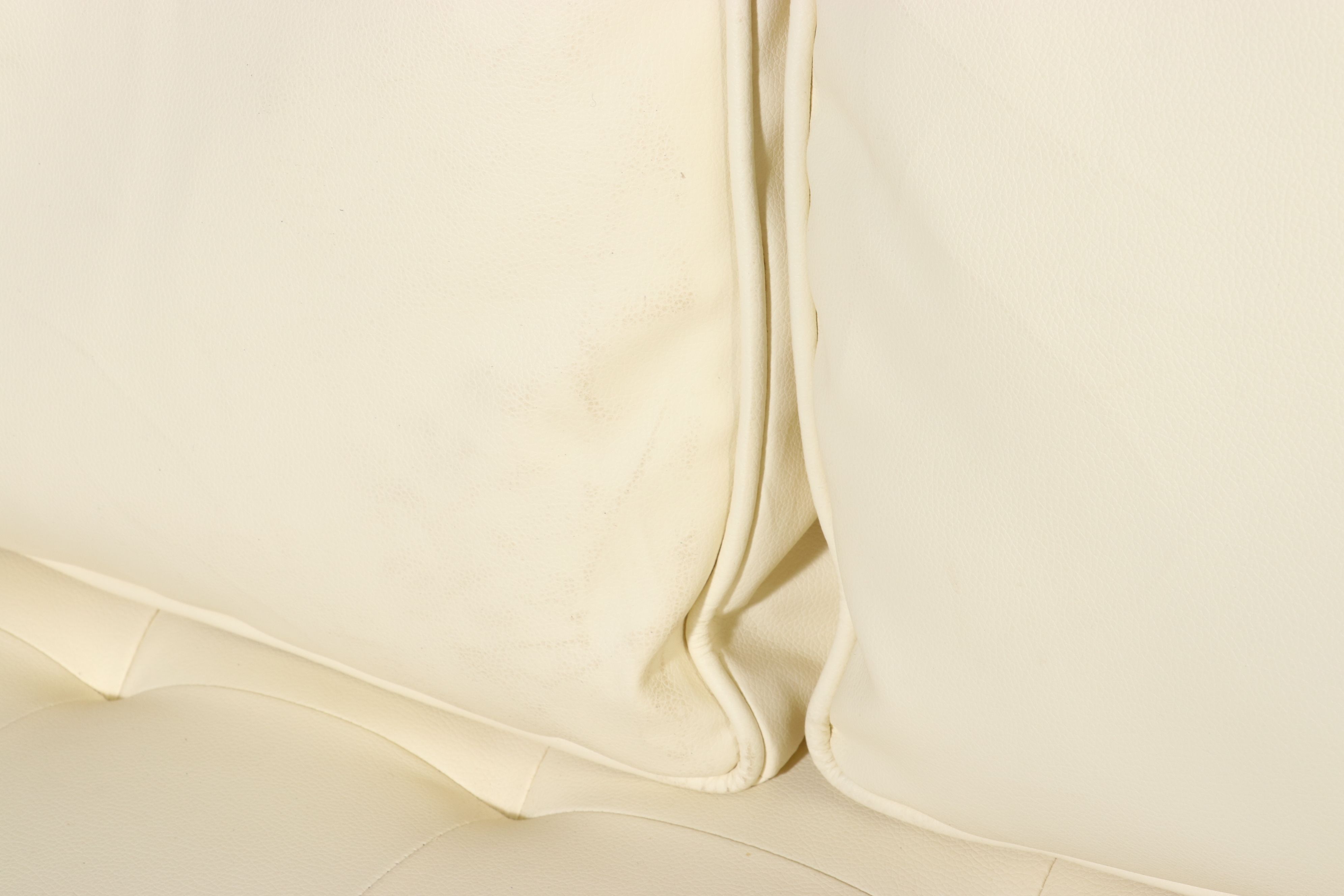 Contemporary Mid Century Modern Style Faux Leather Sofa and Polka Dot Pillows