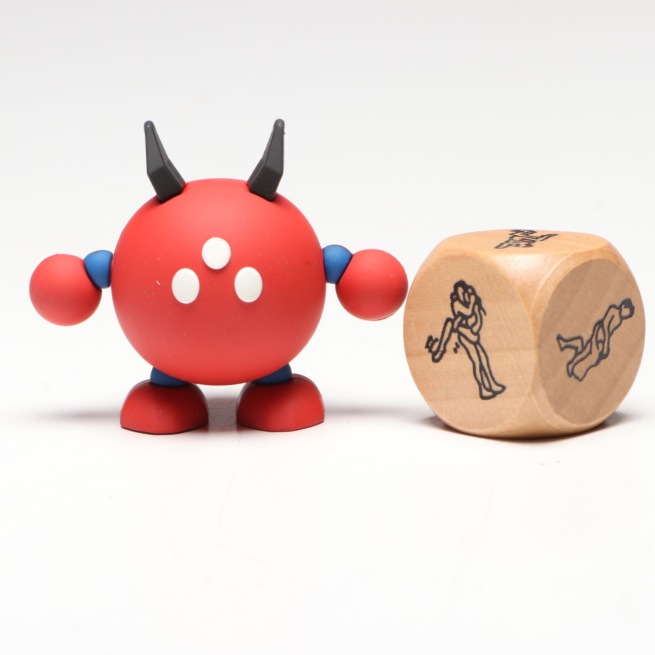 Spherical Horned Character and Novelty Erotic Die, 21st Century