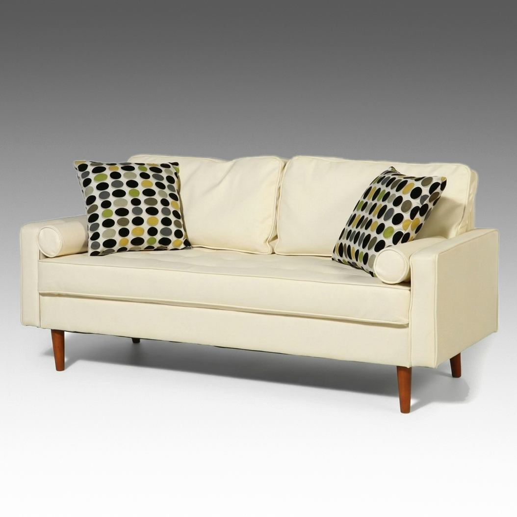 Contemporary Mid Century Modern Style Faux Leather Sofa and Polka Dot Pillows