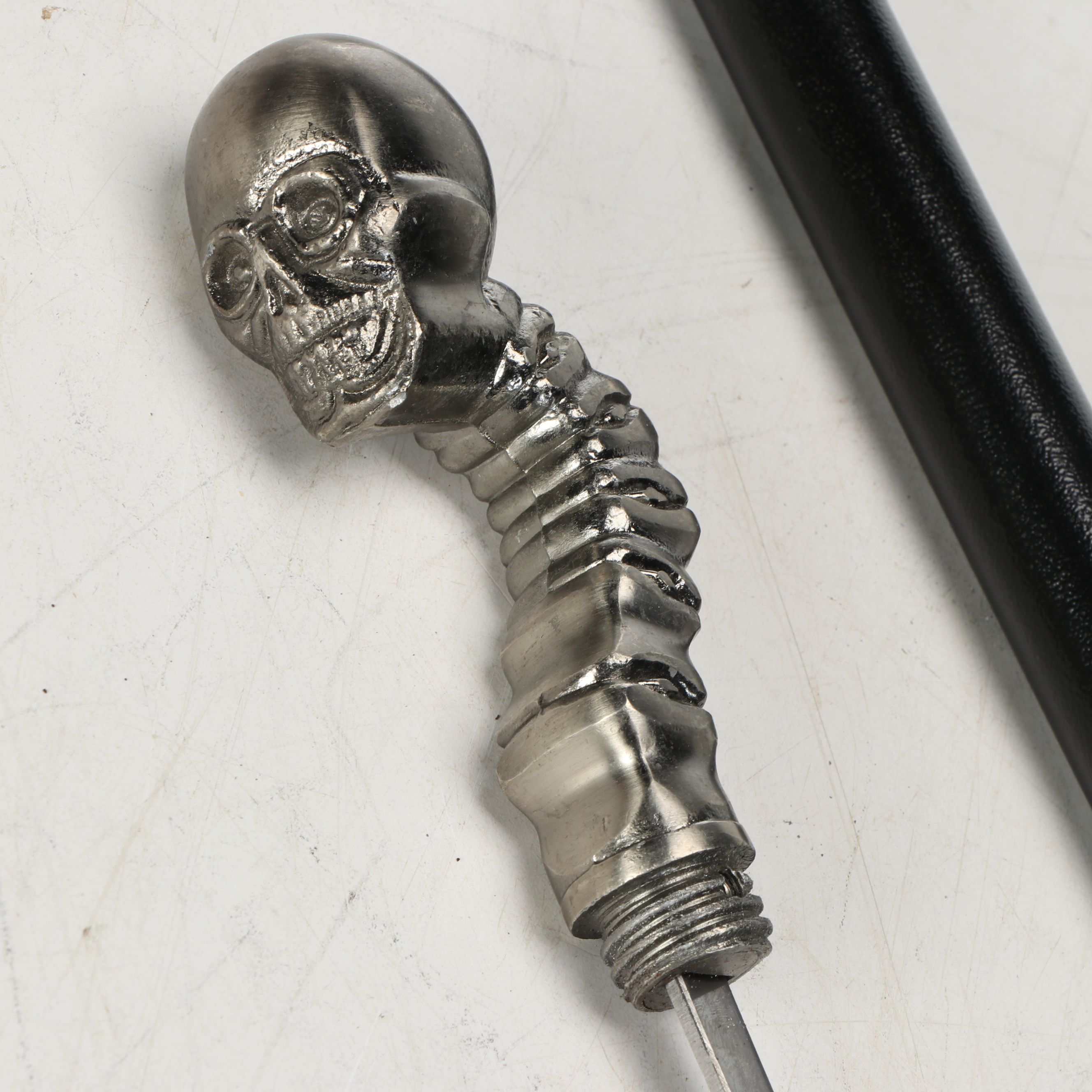 Skull and Spine Handle Sword Cane