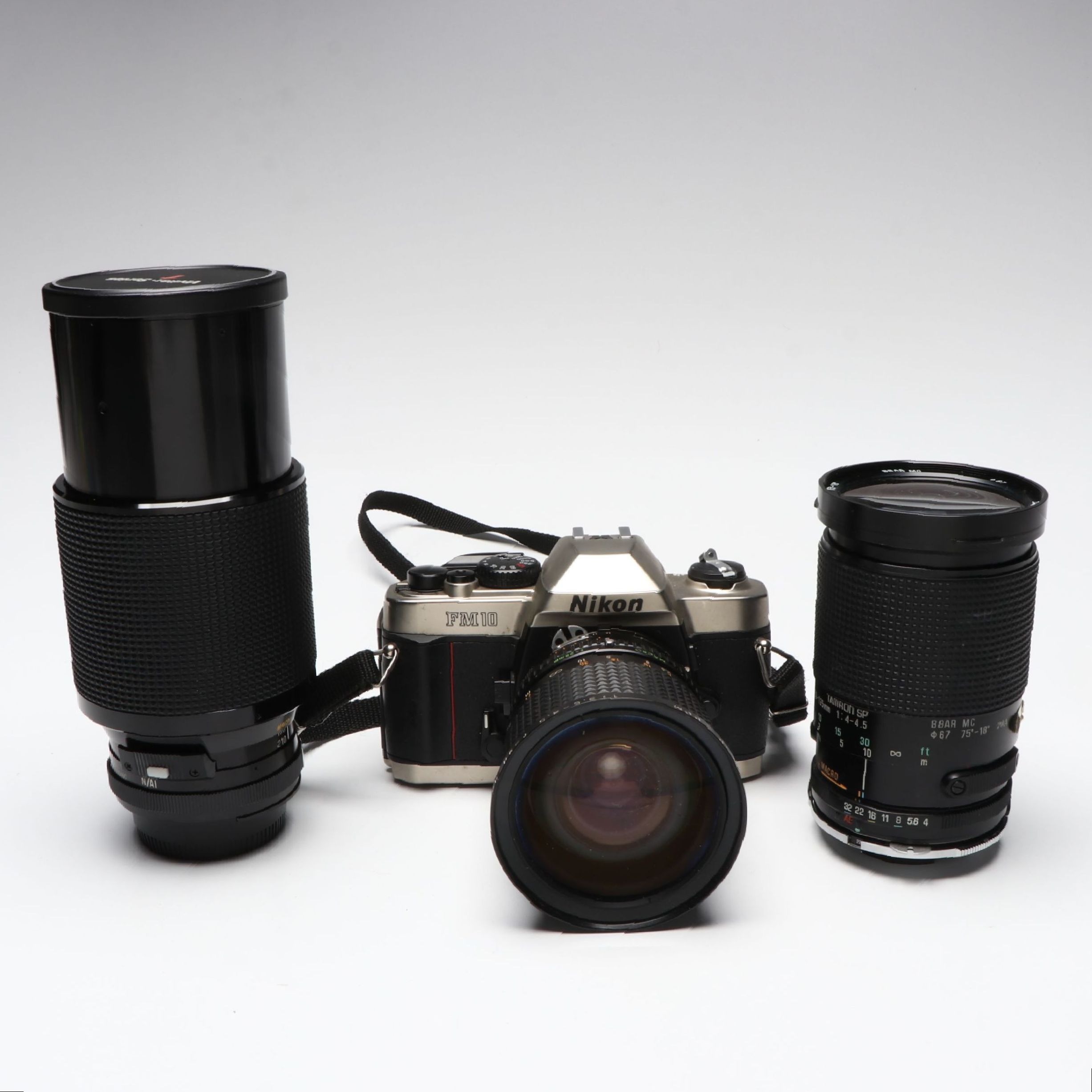 Nikon FM10 SLR Camera with Vivitar Series 1 and Tamron SP Lenses