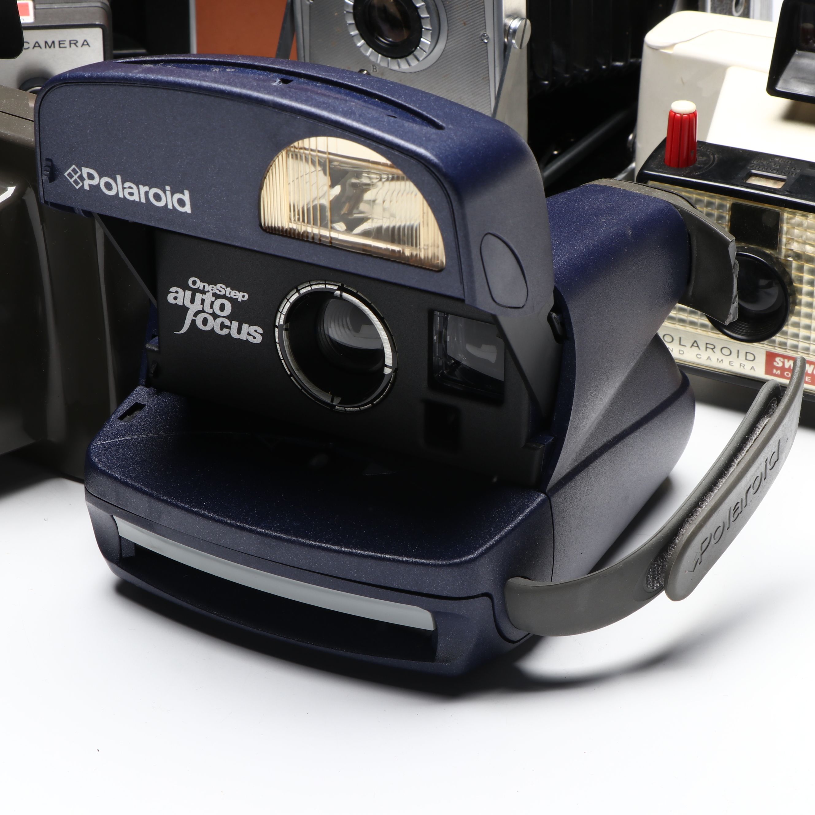 Polaroid Land Camera 150 in Case and More Instant Cameras, Mid to Late 20th C.