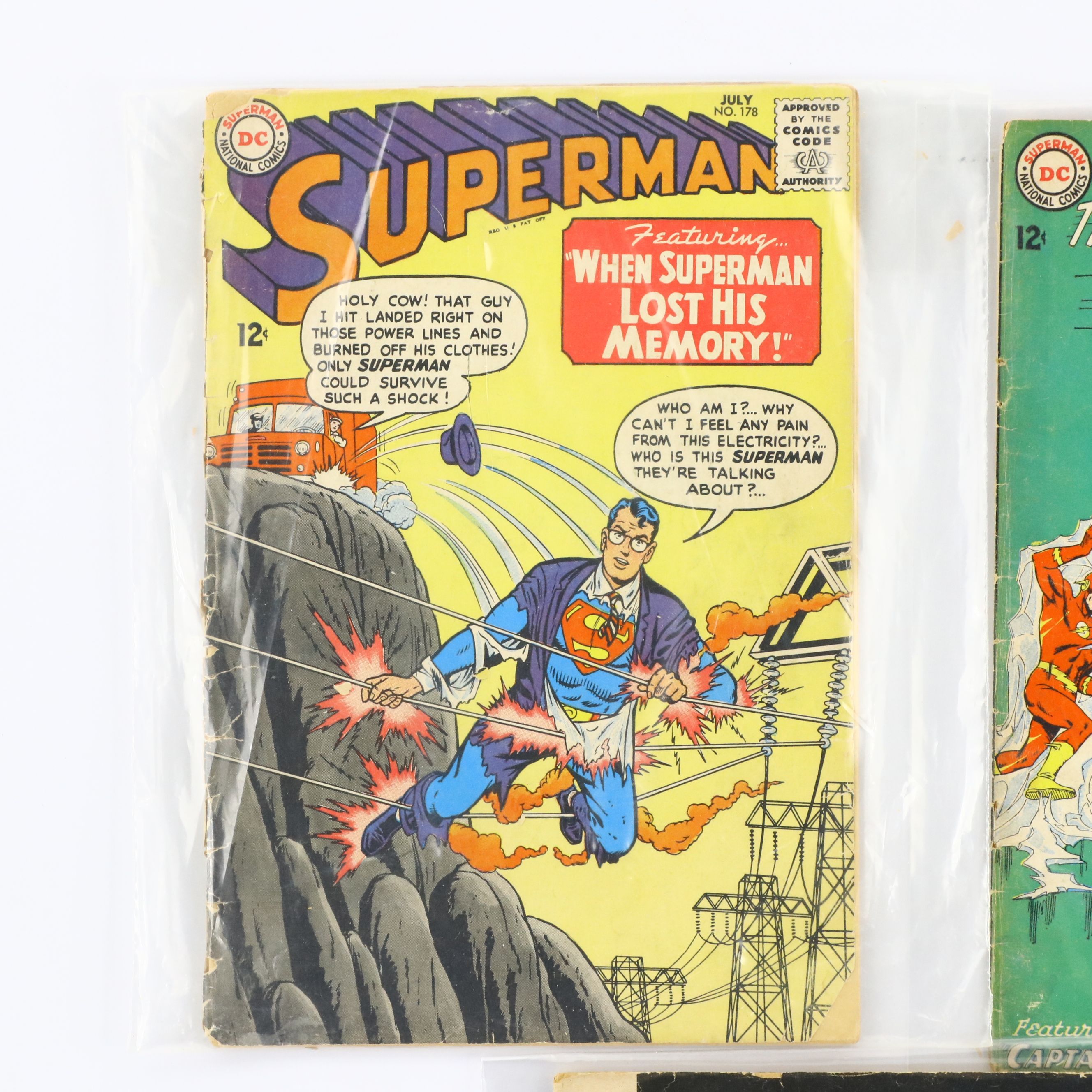 "Superman", "Strange Tales" and "The Flash" Comic Books