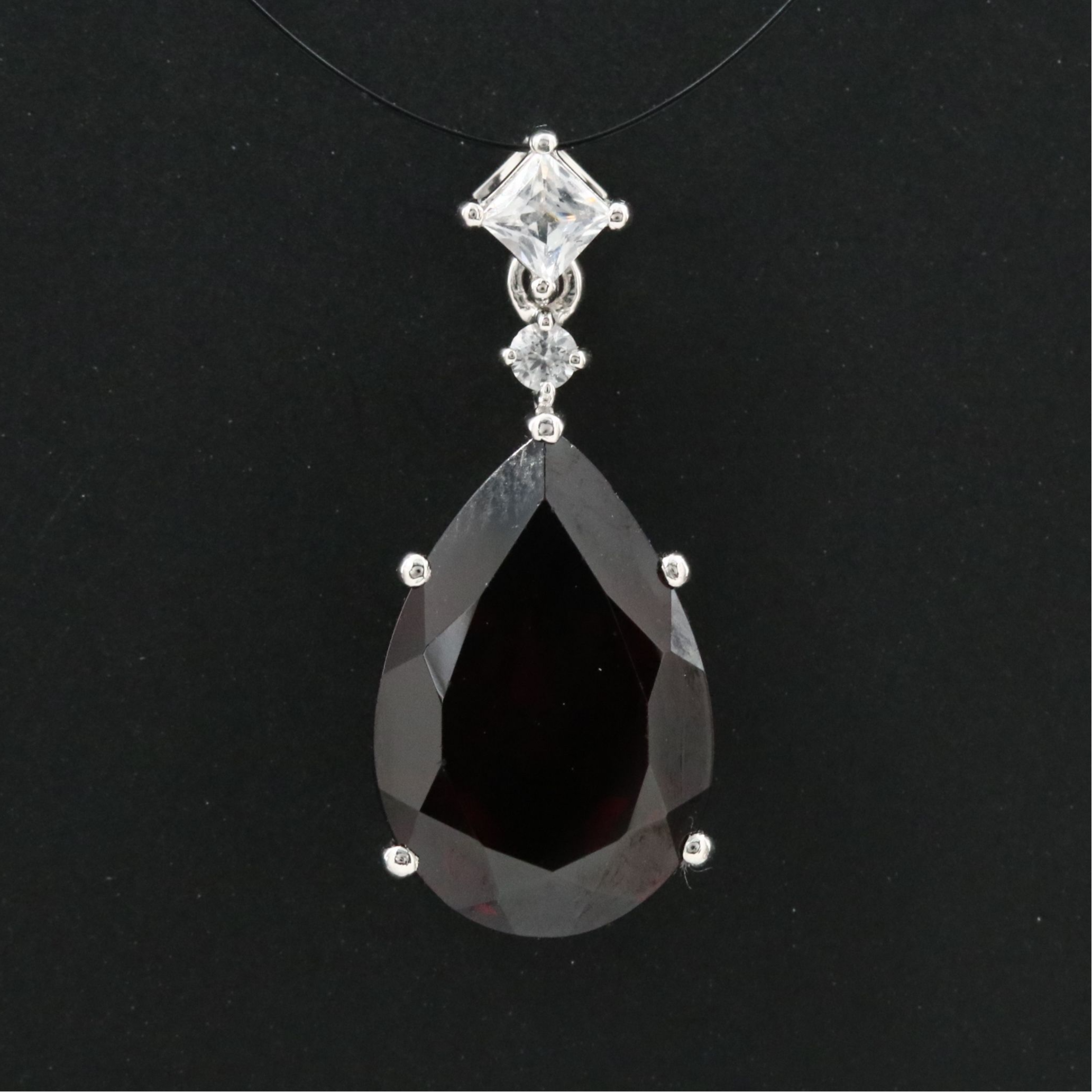 Platinum Garnet and White Sapphire Pendant