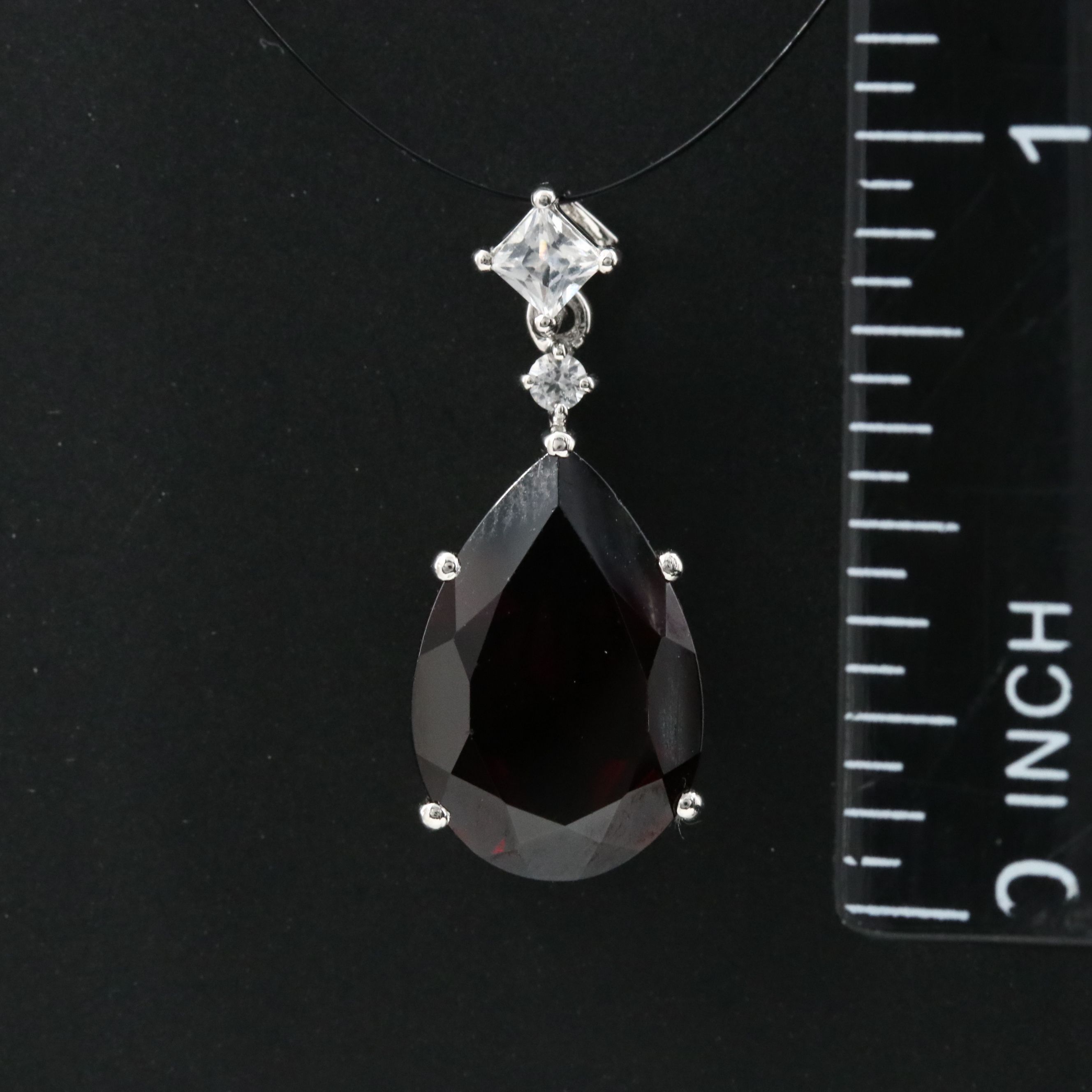Platinum Garnet and White Sapphire Pendant