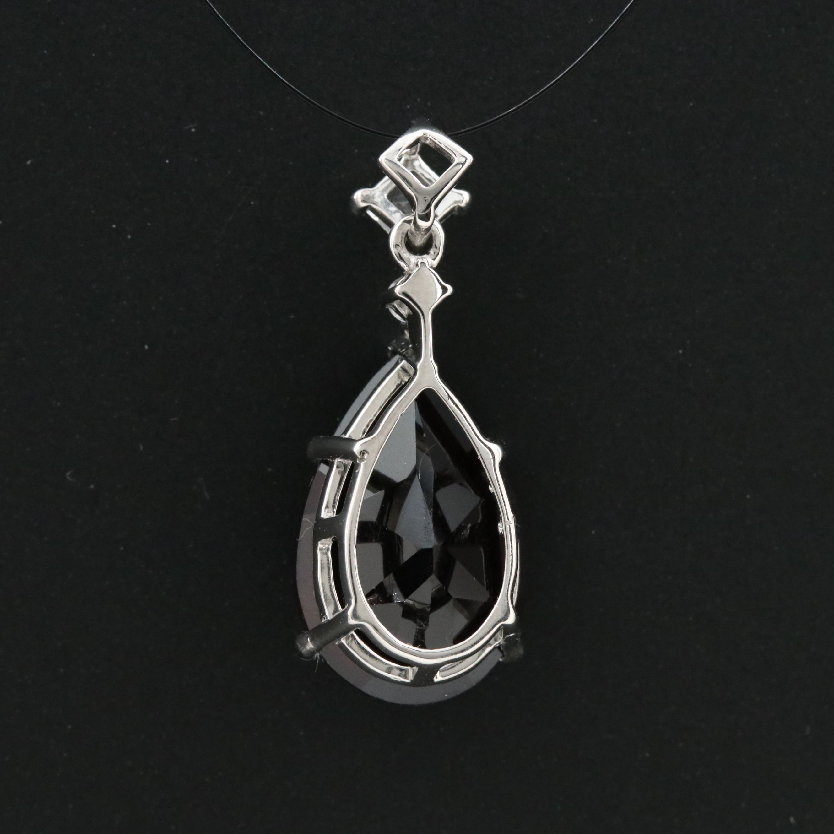 Platinum Garnet and White Sapphire Pendant
