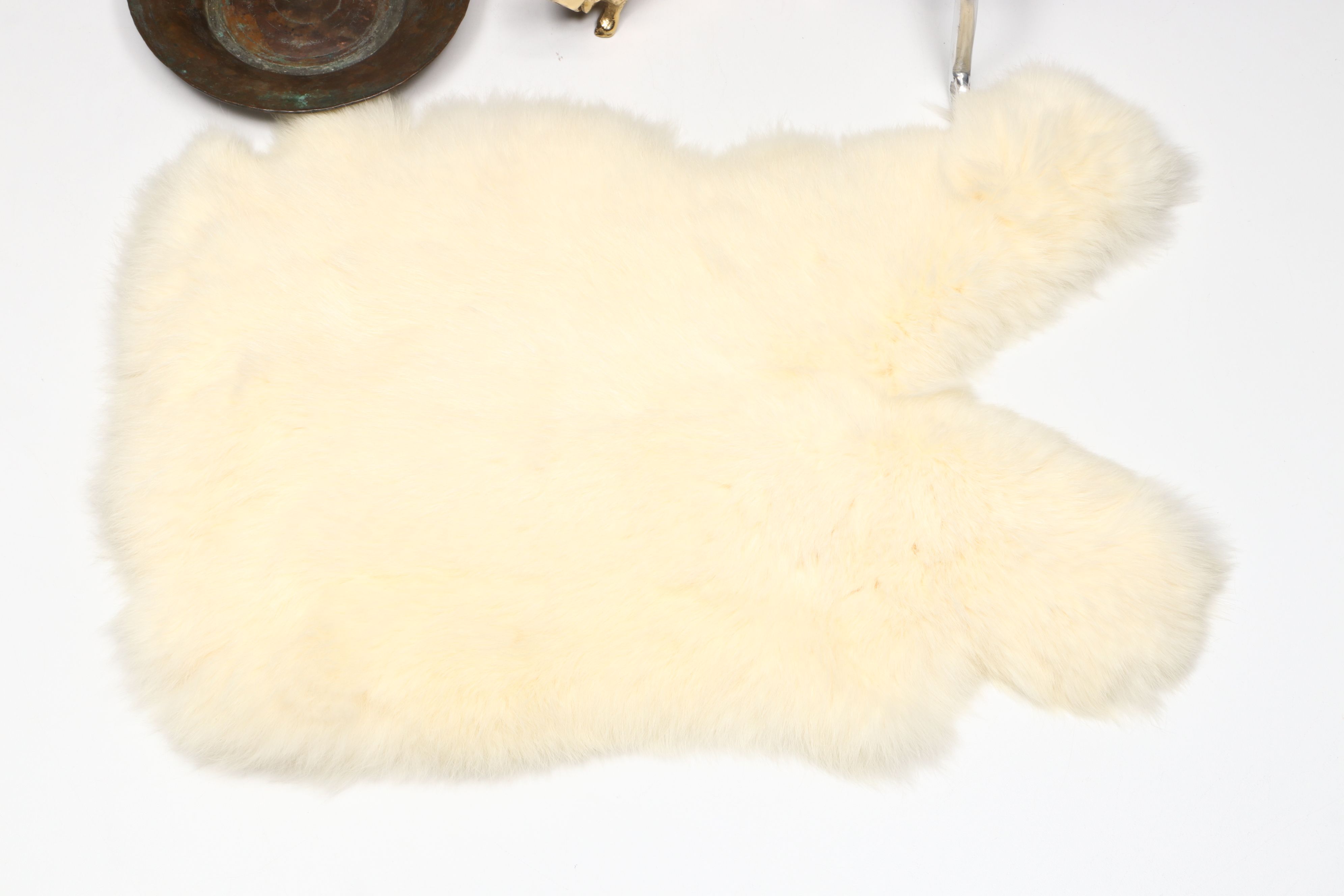 Rabbit Fur Pelt with Postmodern Candleholder and More Office Décor