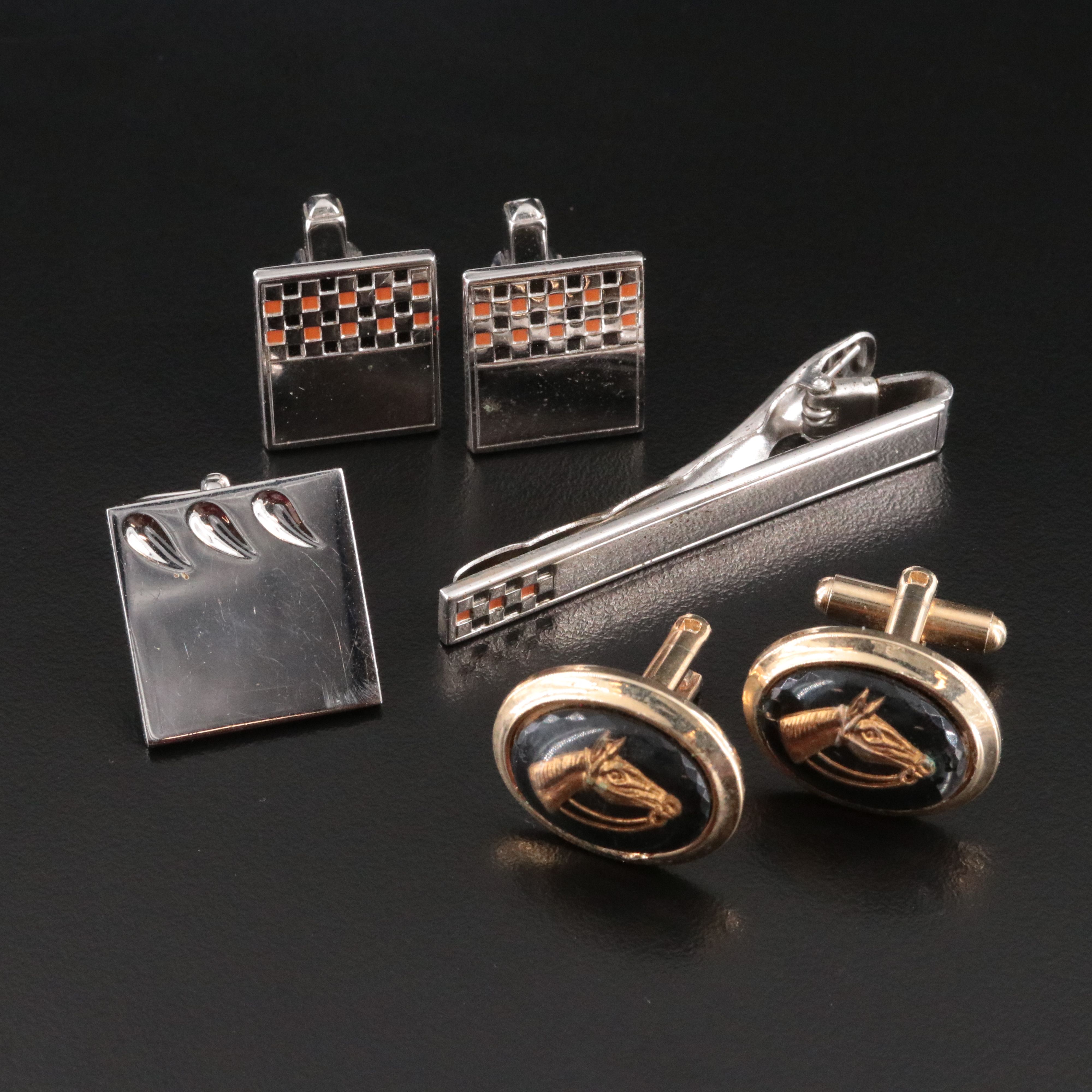 Anson Cufflink and Tie Clip Set and Reverse Carved Horses Featured in Cufflinks