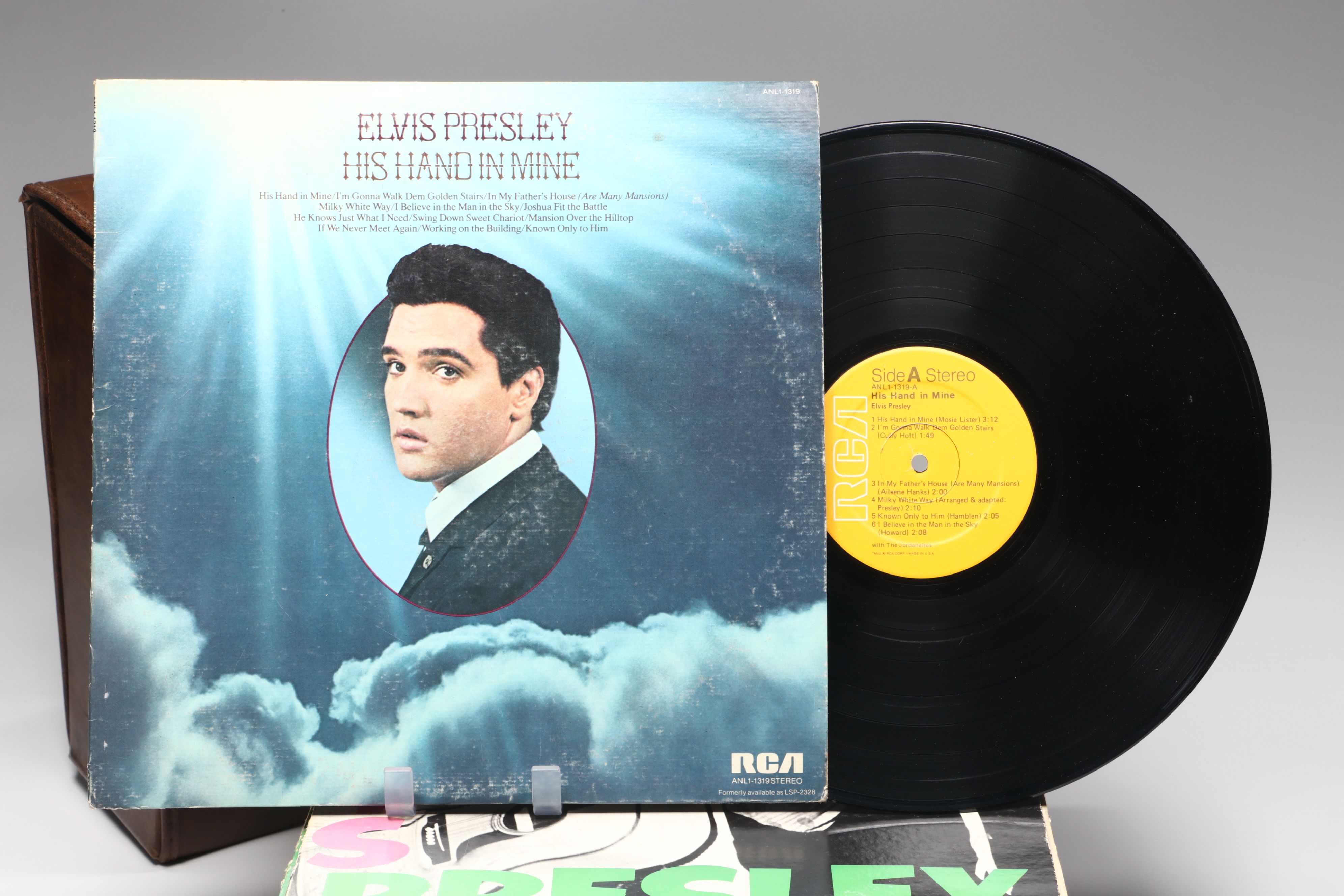"His Hand in Mine," "Moody Blue" and More Elvis Records