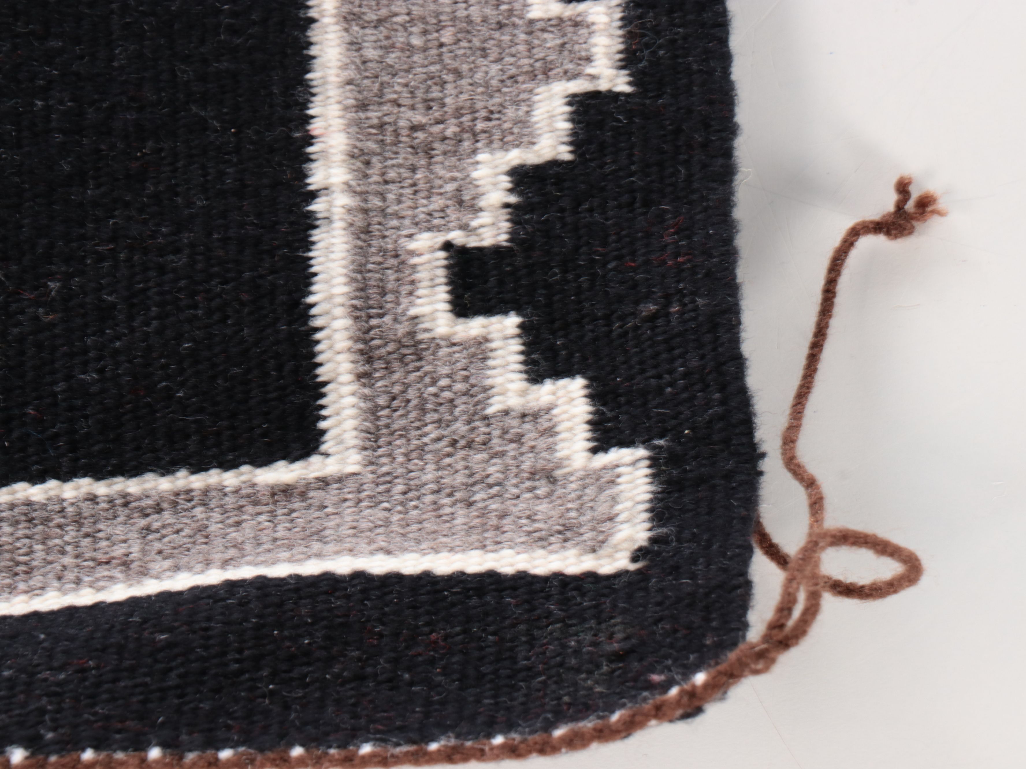 1'10 x 2'9 Handwoven Navajo Two Gray Hills Style Wool Rug