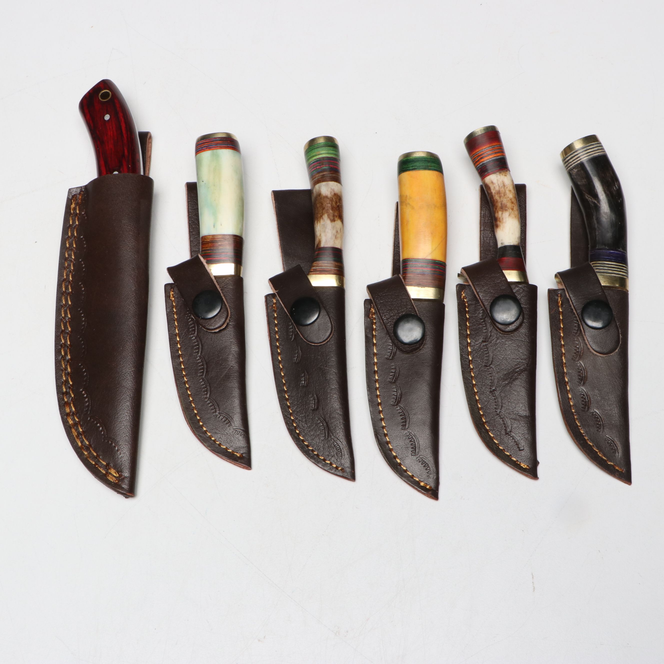 Damascus Steel Skinner and Hunting Knives in Leather Scabbards