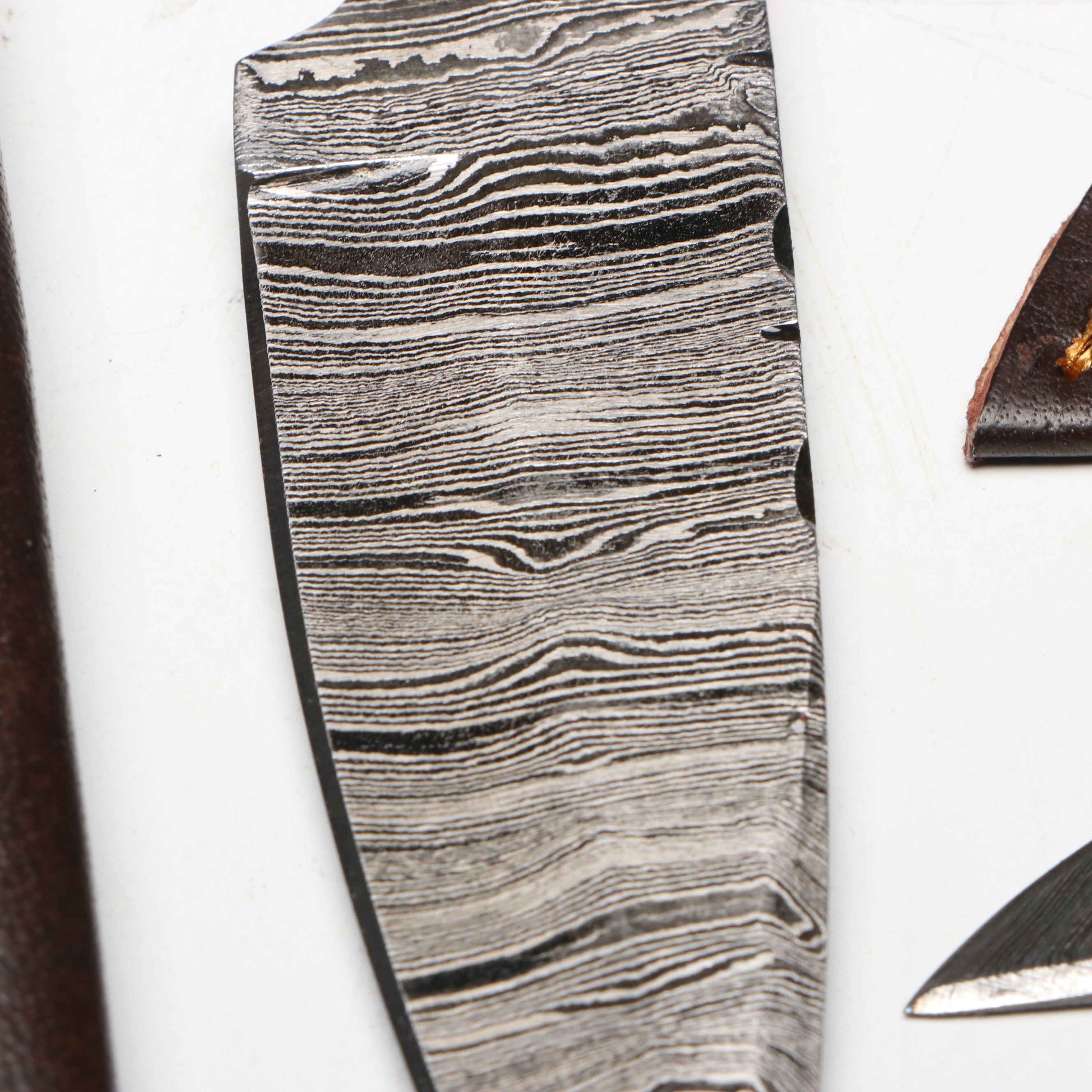 Damascus Steel Skinner and Hunting Knives in Leather Scabbards