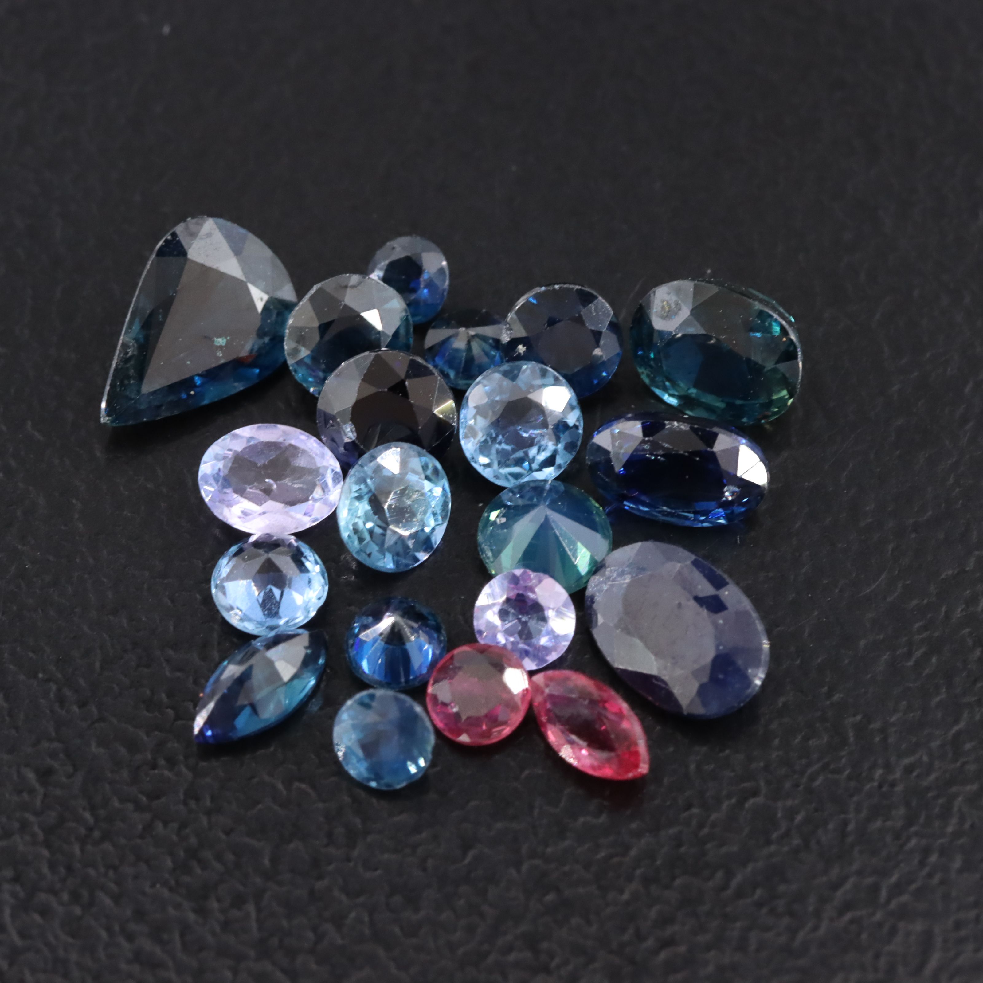 Loose 5.02 CTW Melee Lot of Sapphires, Rubies, and Lab Grown Sapphires