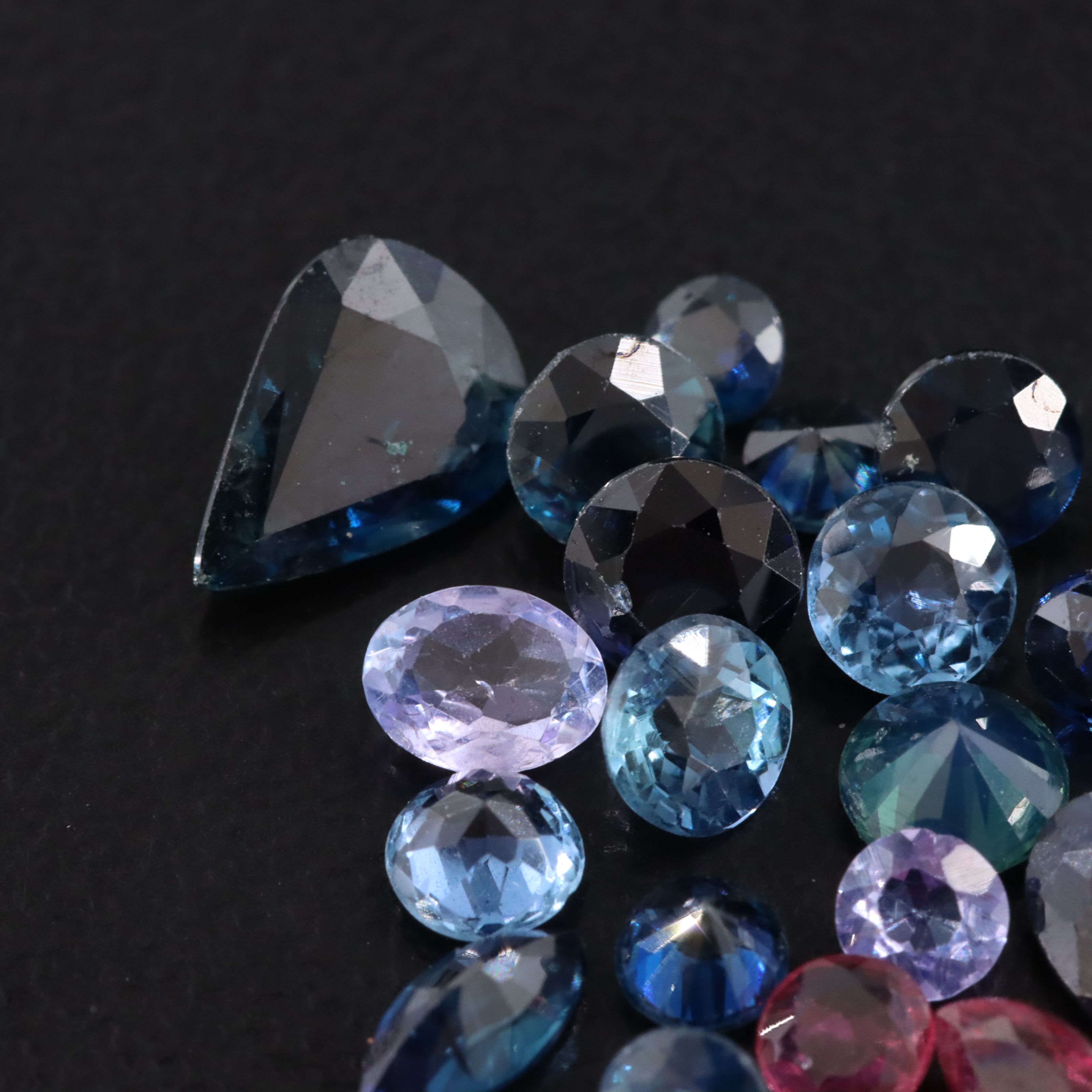 Loose 5.02 CTW Melee Lot of Sapphires, Rubies, and Lab Grown Sapphires