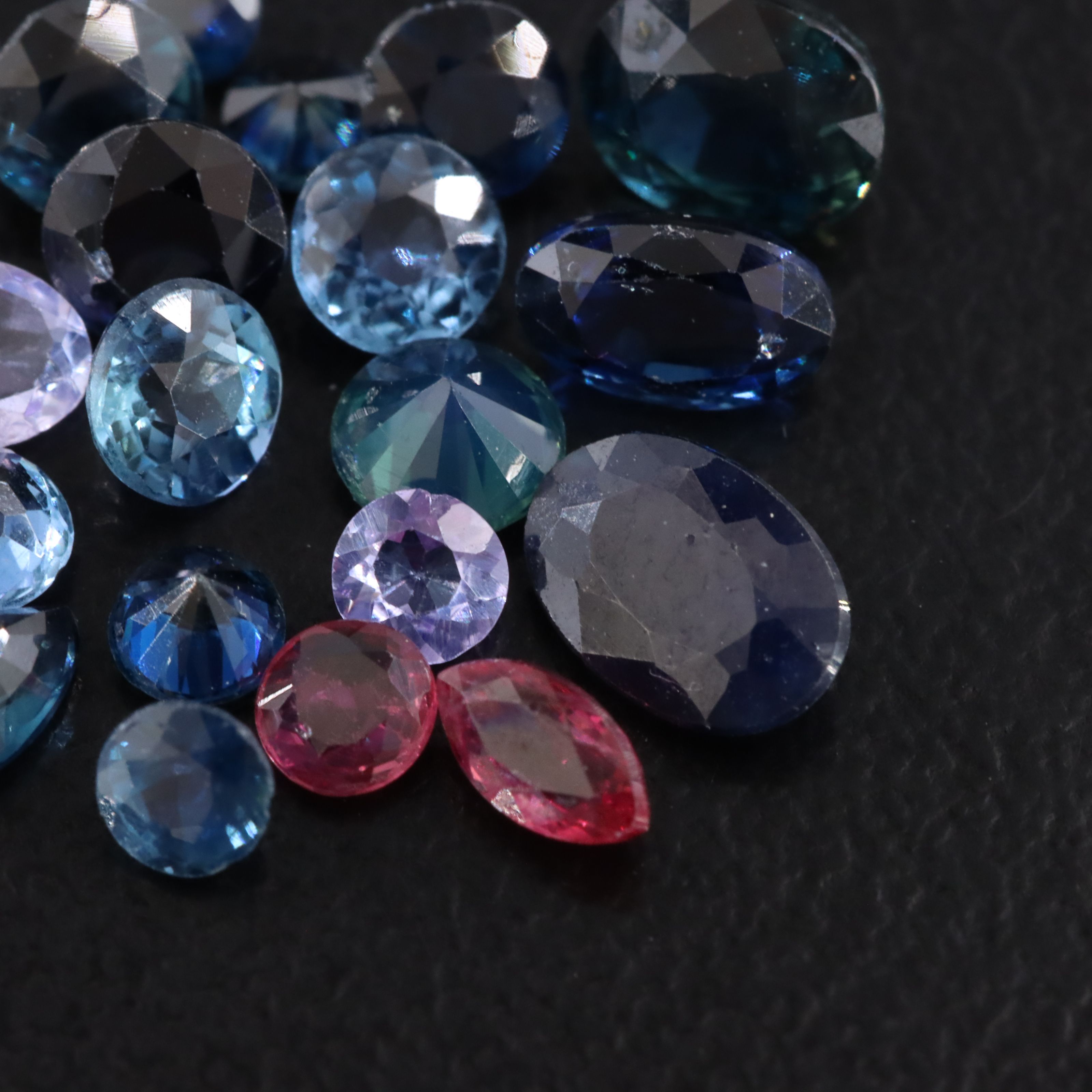Loose 5.02 CTW Melee Lot of Sapphires, Rubies, and Lab Grown Sapphires