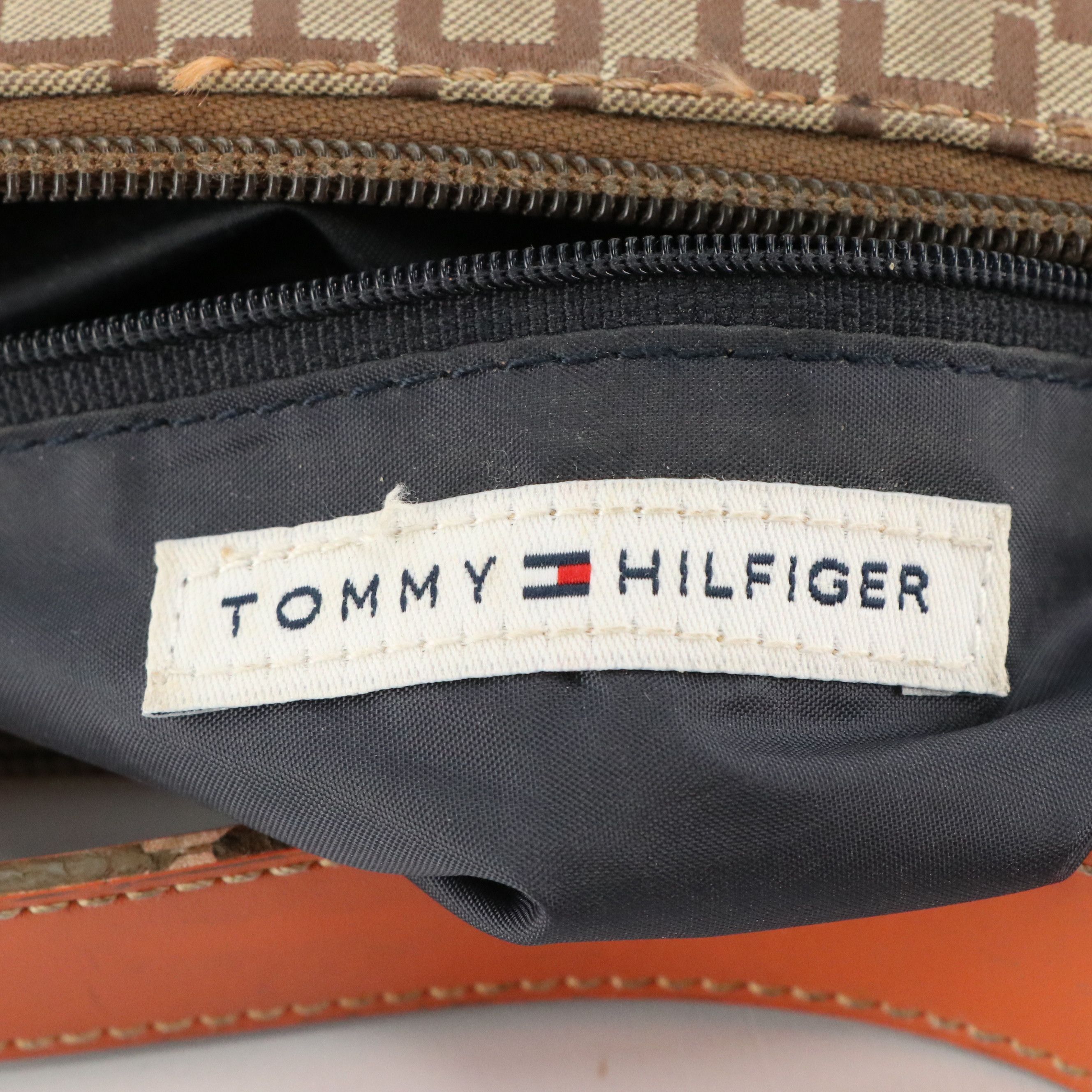 Tommy Hilfiger Small Shoulder Bag in Brown TH Monogram and Orange Faux-Leather