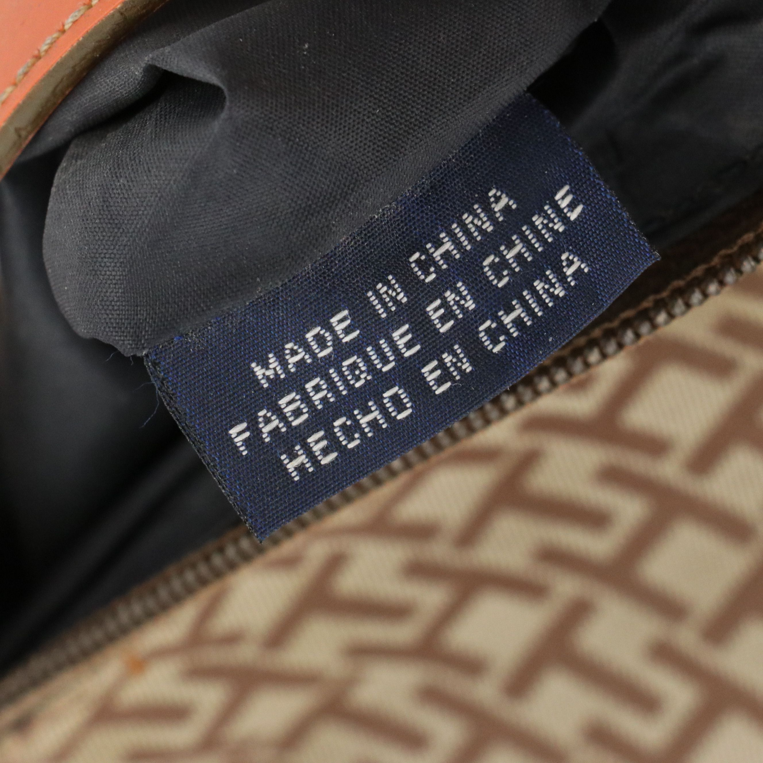 Tommy Hilfiger Small Shoulder Bag in Brown TH Monogram and Orange Faux-Leather