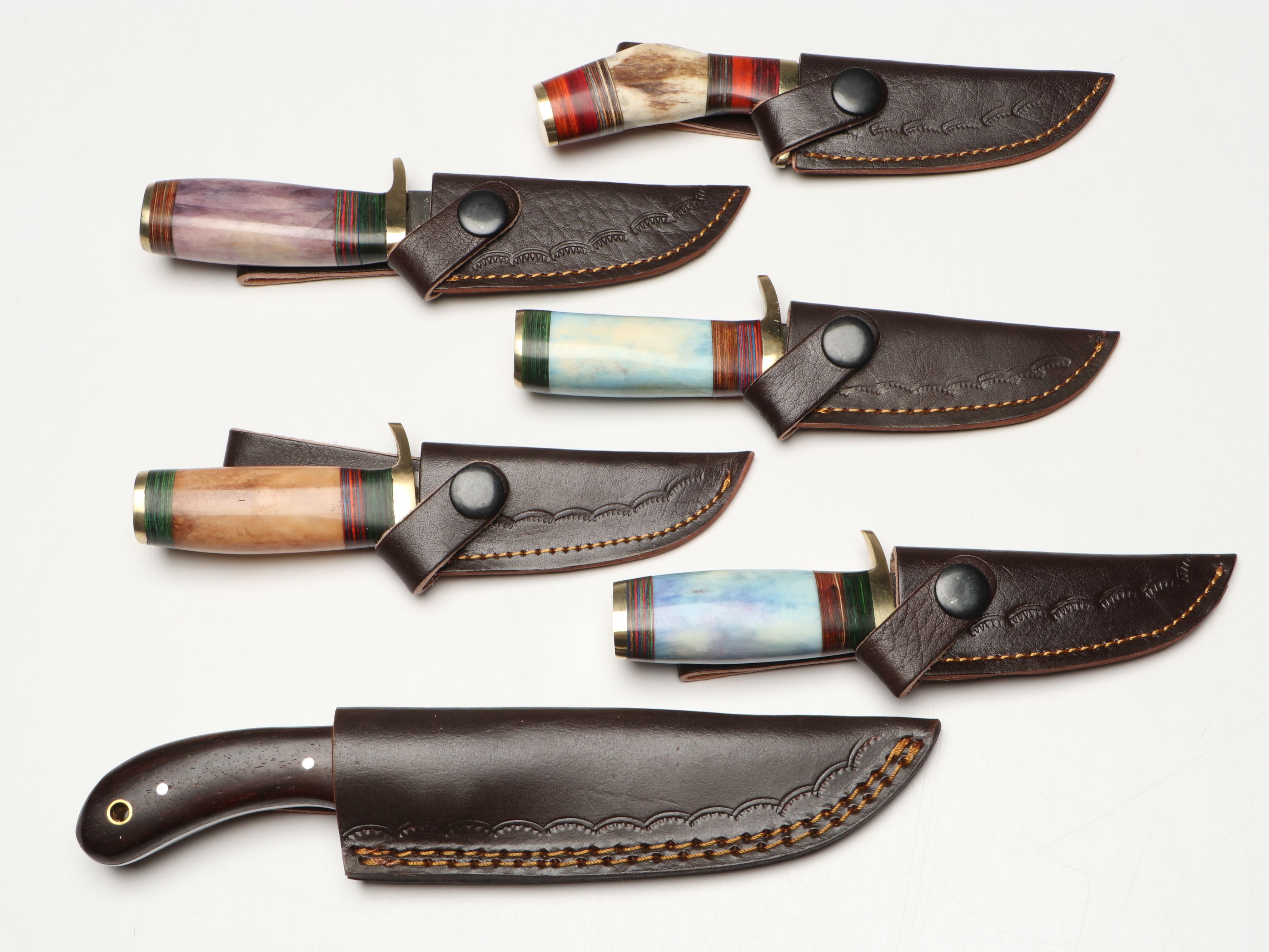 Damascus Steel Skinner and Hunting Knives in Leather Scabbards