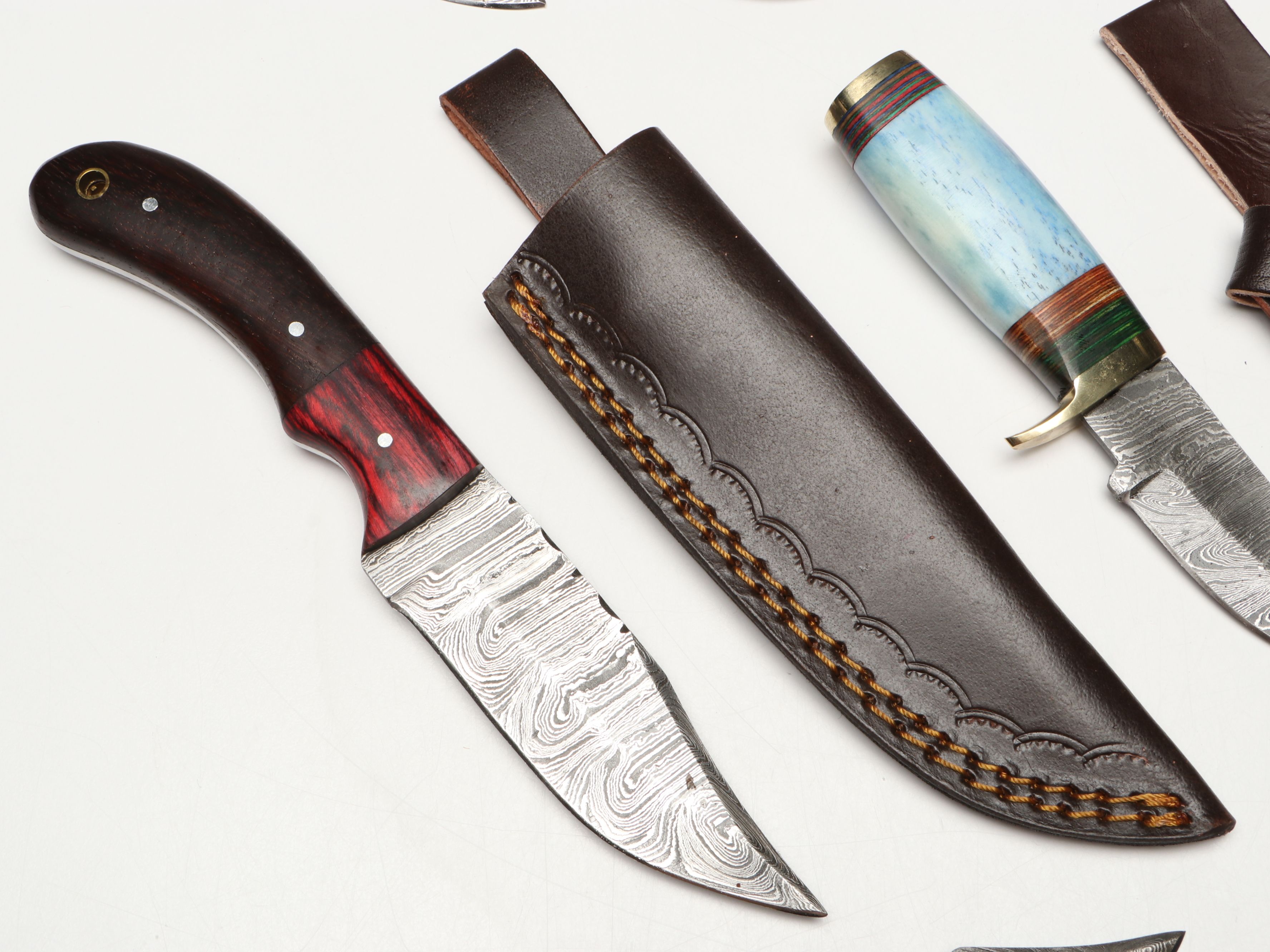 Damascus Steel Skinner and Hunting Knives in Leather Scabbards