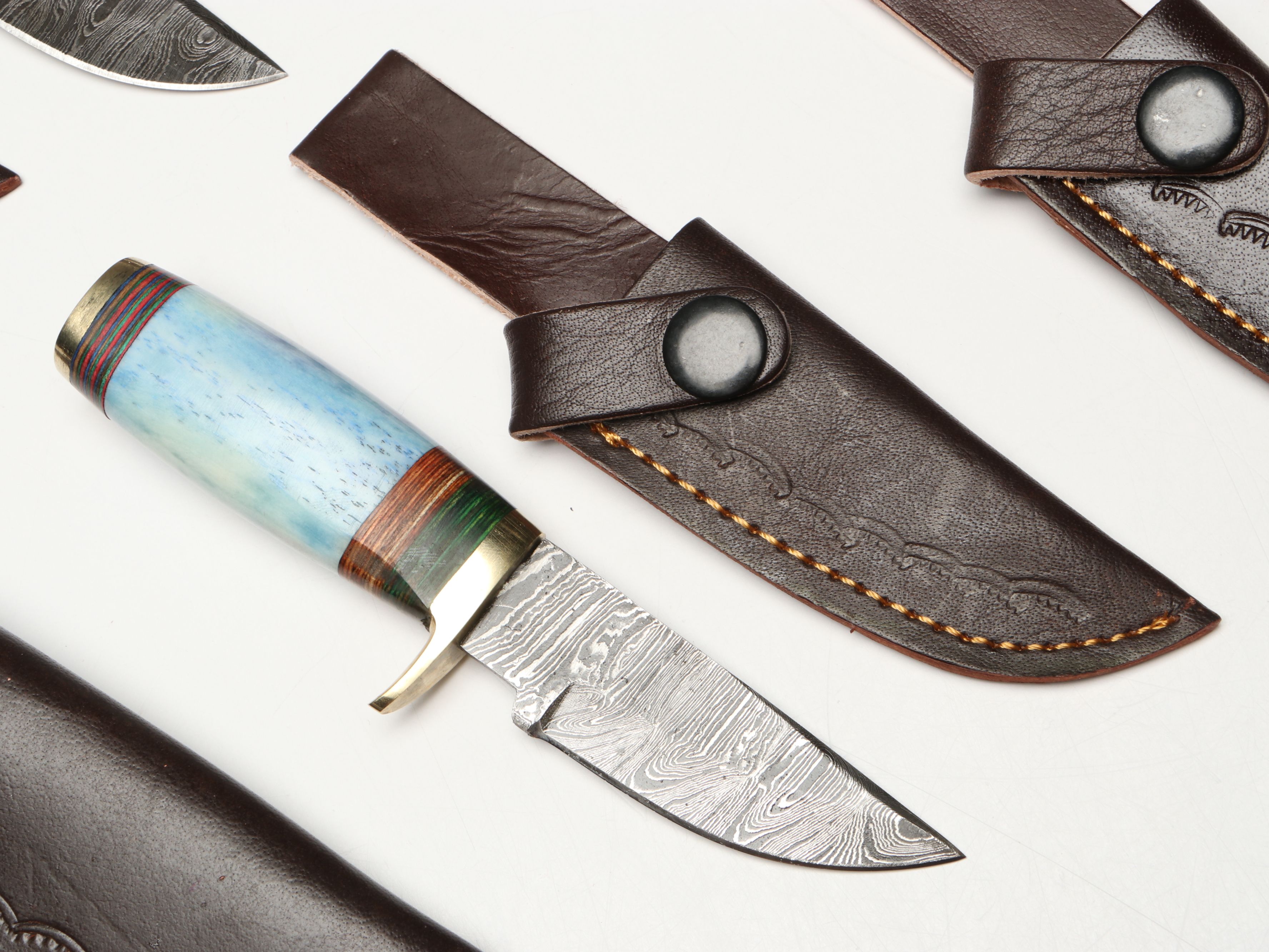 Damascus Steel Skinner and Hunting Knives in Leather Scabbards