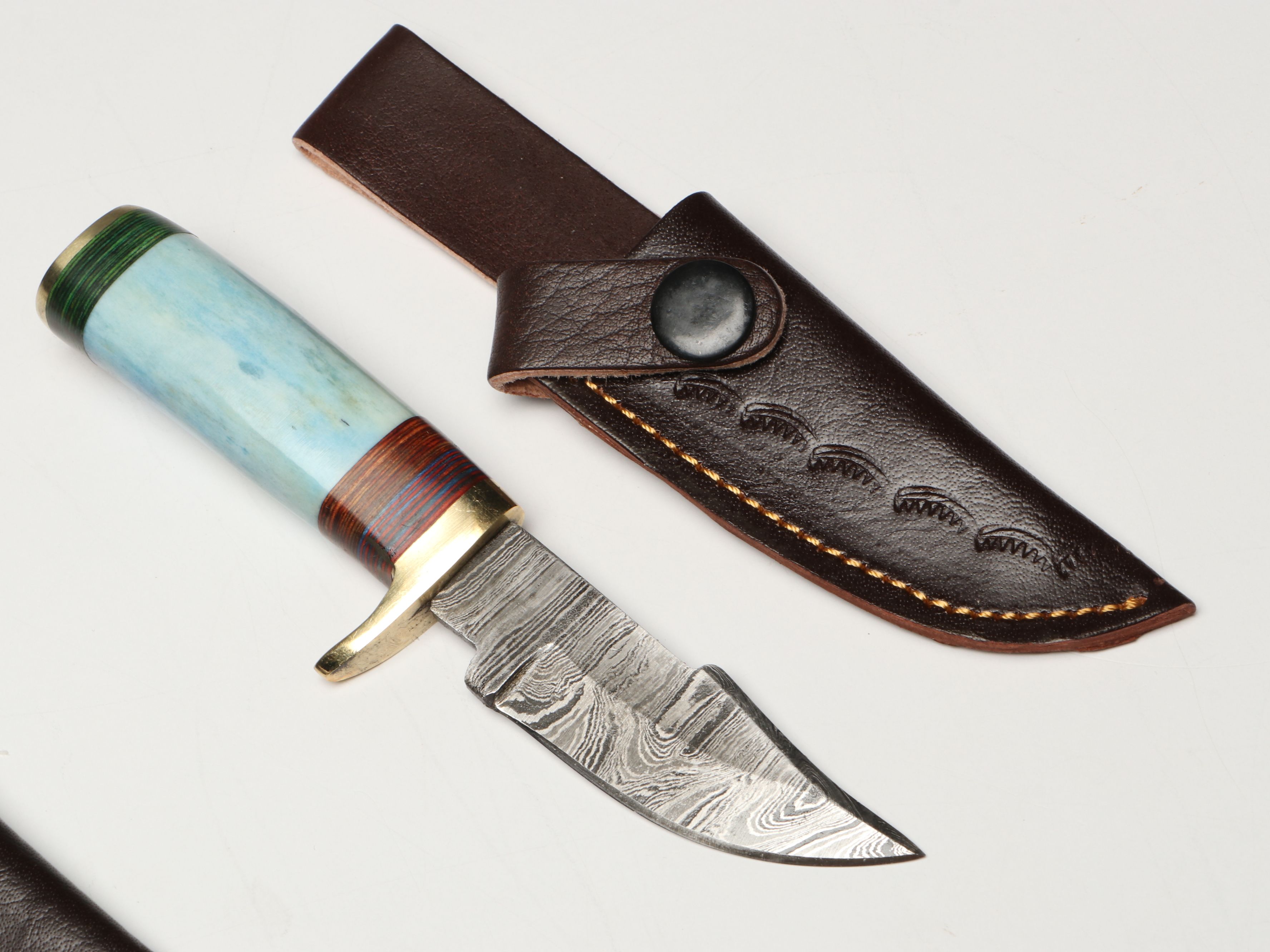 Damascus Steel Skinner and Hunting Knives in Leather Scabbards