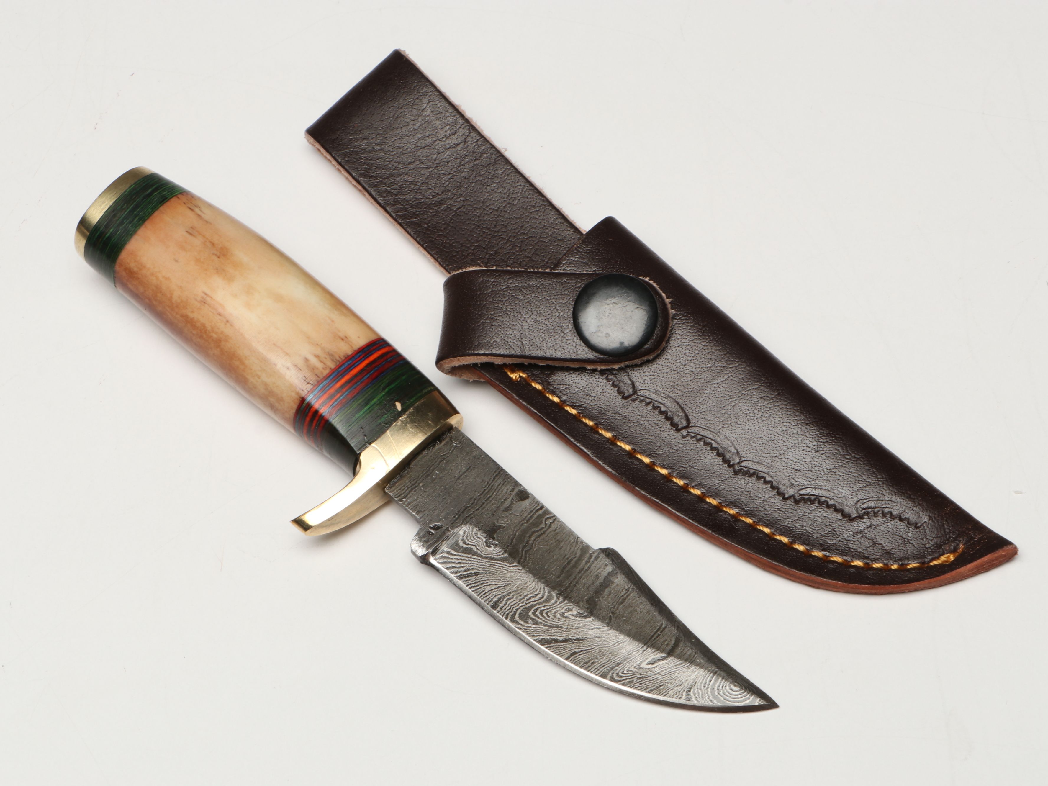 Damascus Steel Skinner and Hunting Knives in Leather Scabbards