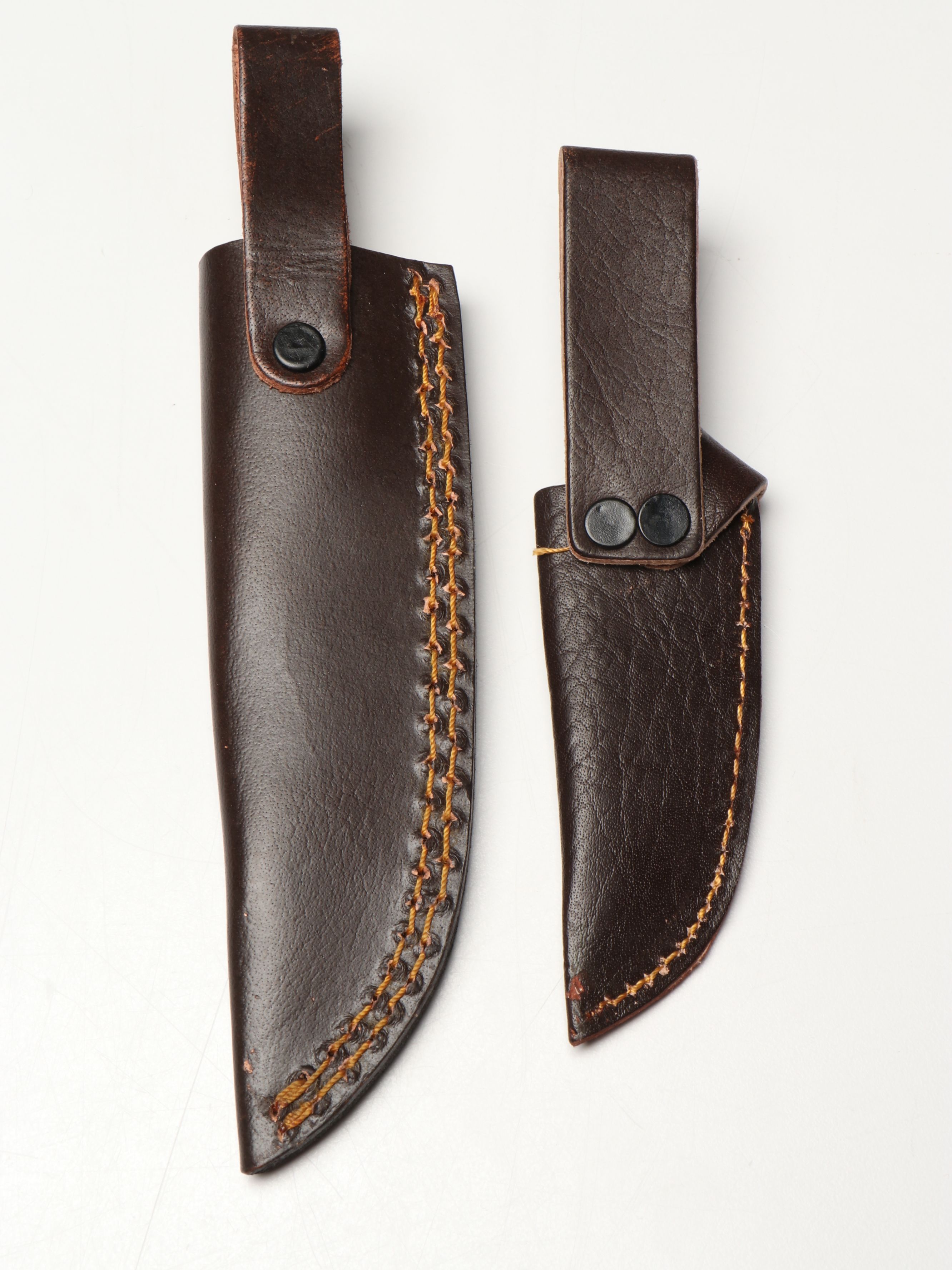 Damascus Steel Skinner and Hunting Knives in Leather Scabbards