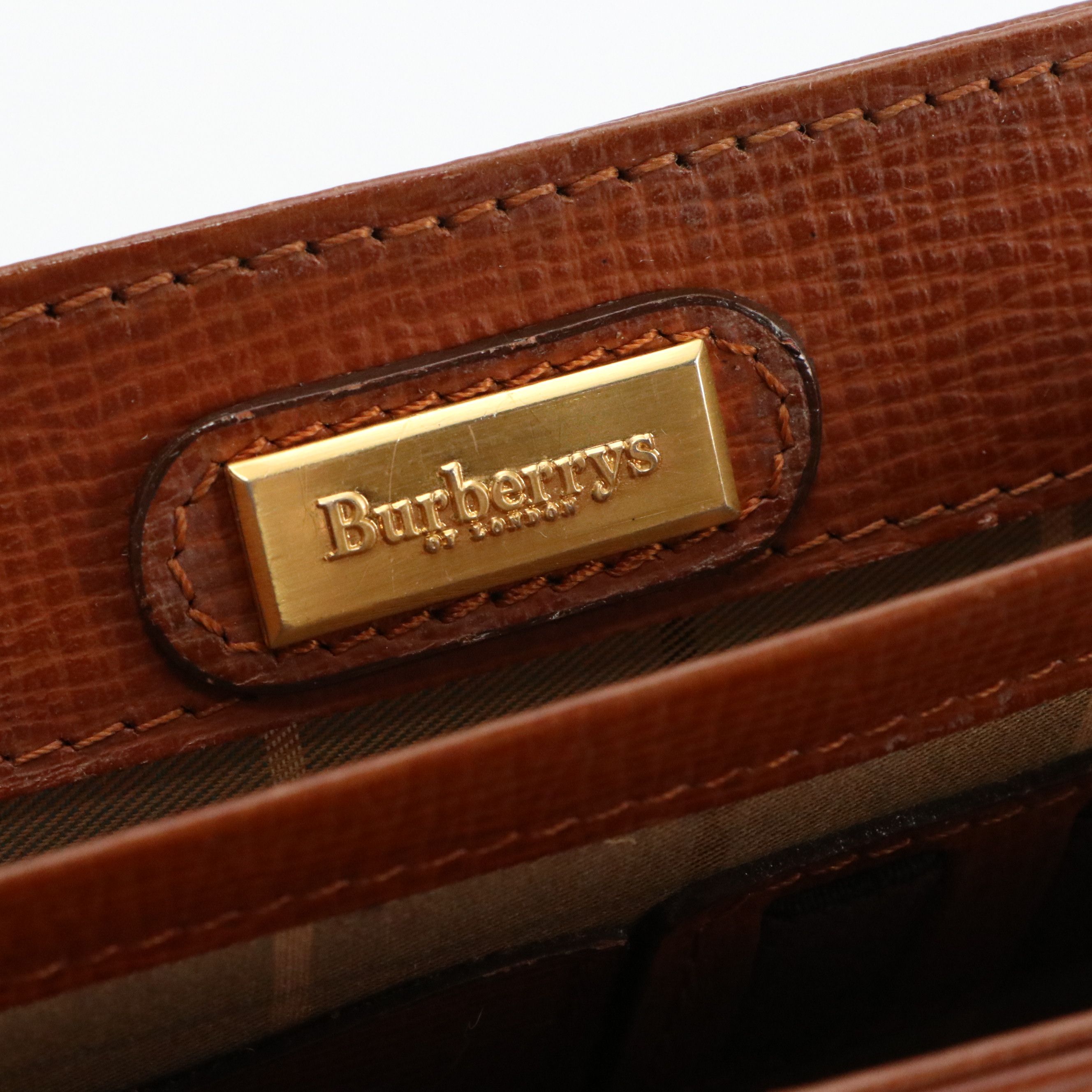 Burberrys Flap Wristlet Clutch in Brown Leather