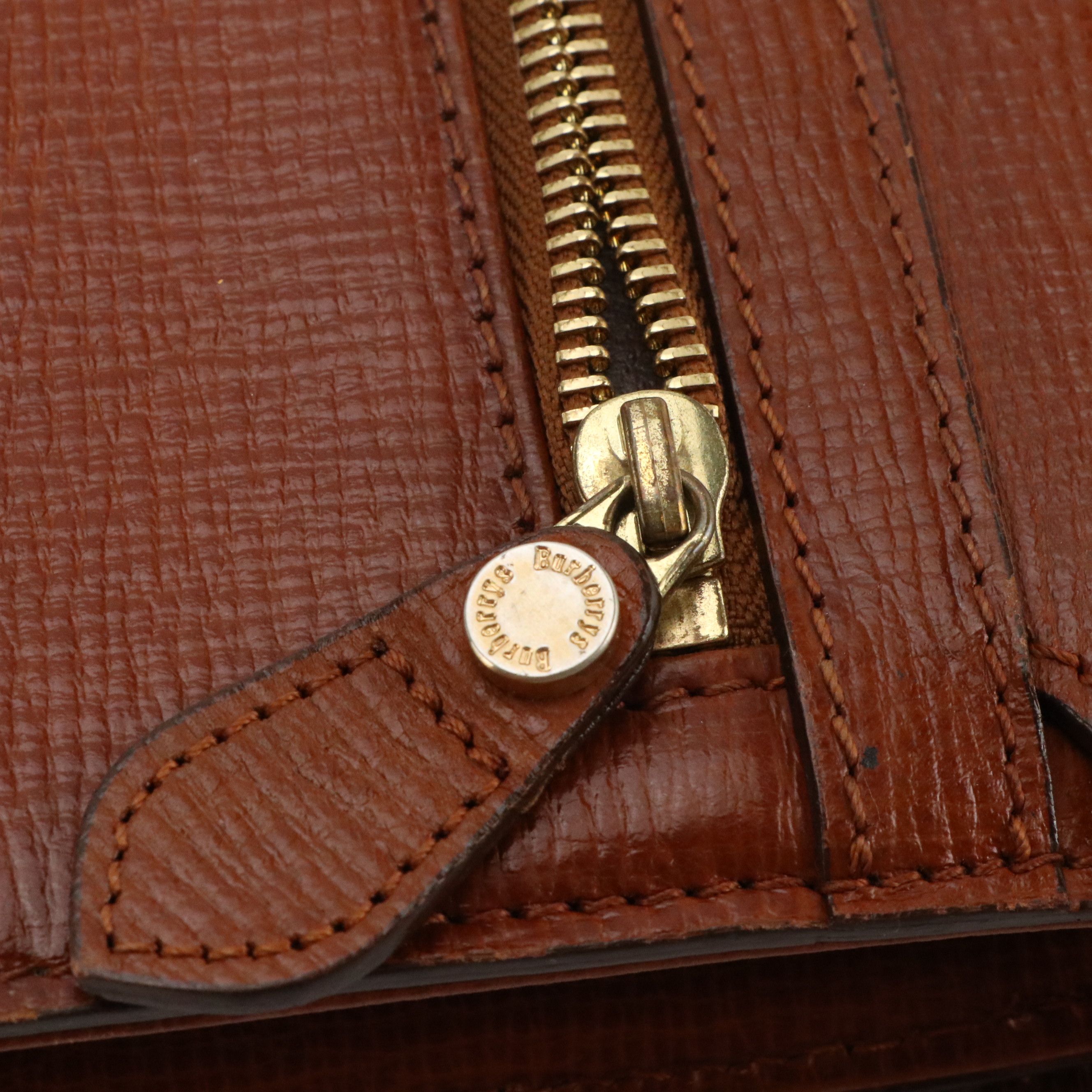 Burberrys Flap Wristlet Clutch in Brown Leather