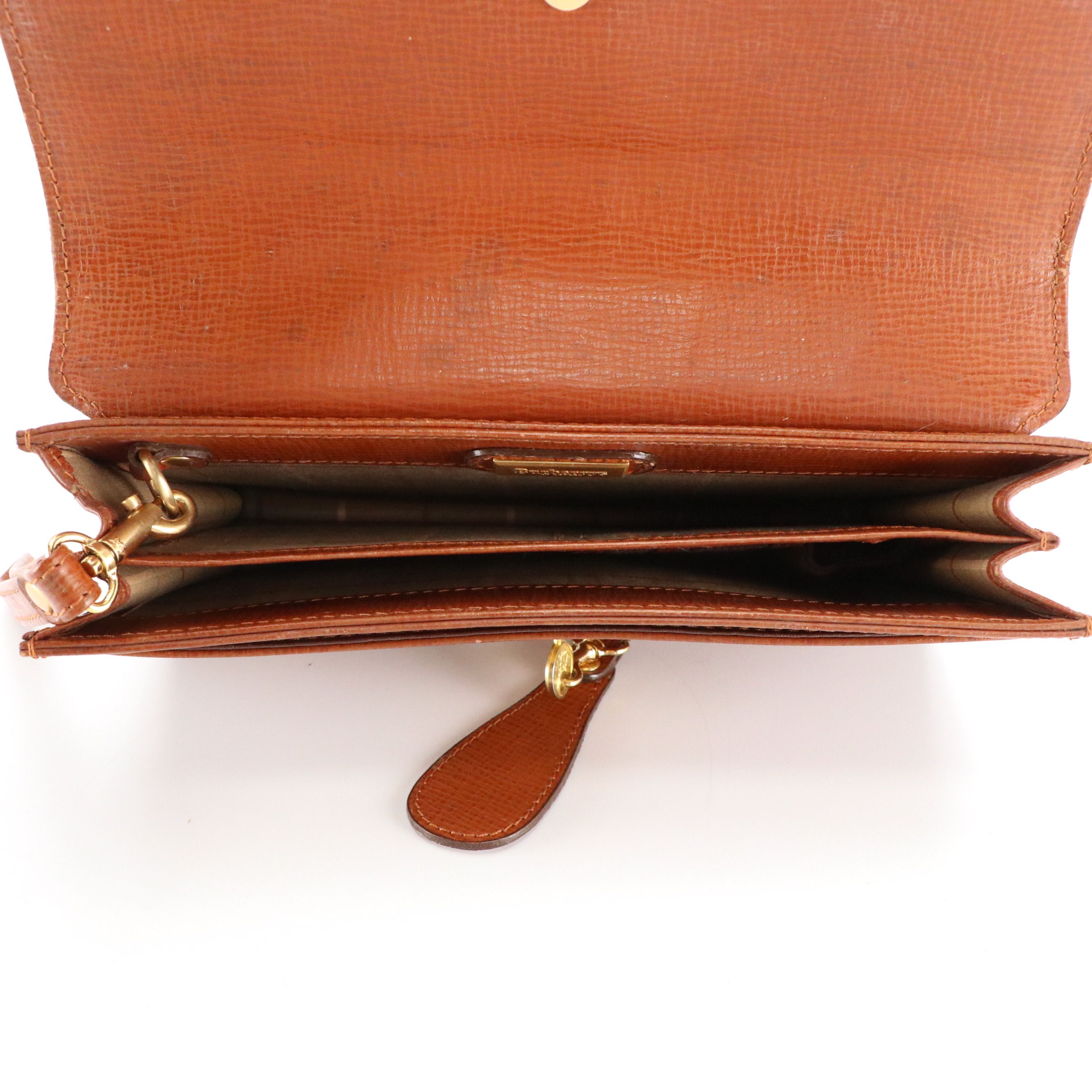 Burberrys Flap Wristlet Clutch in Brown Leather