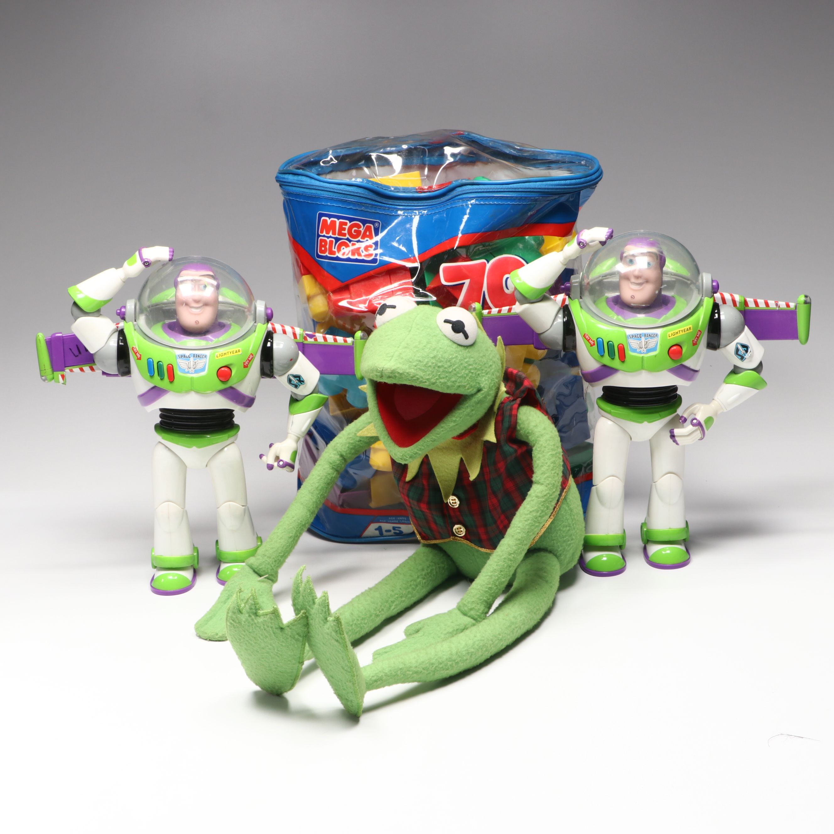 Plush Kermit the Frog, Buzz Lightyear Toys, and Mega Bloks Building Blocks