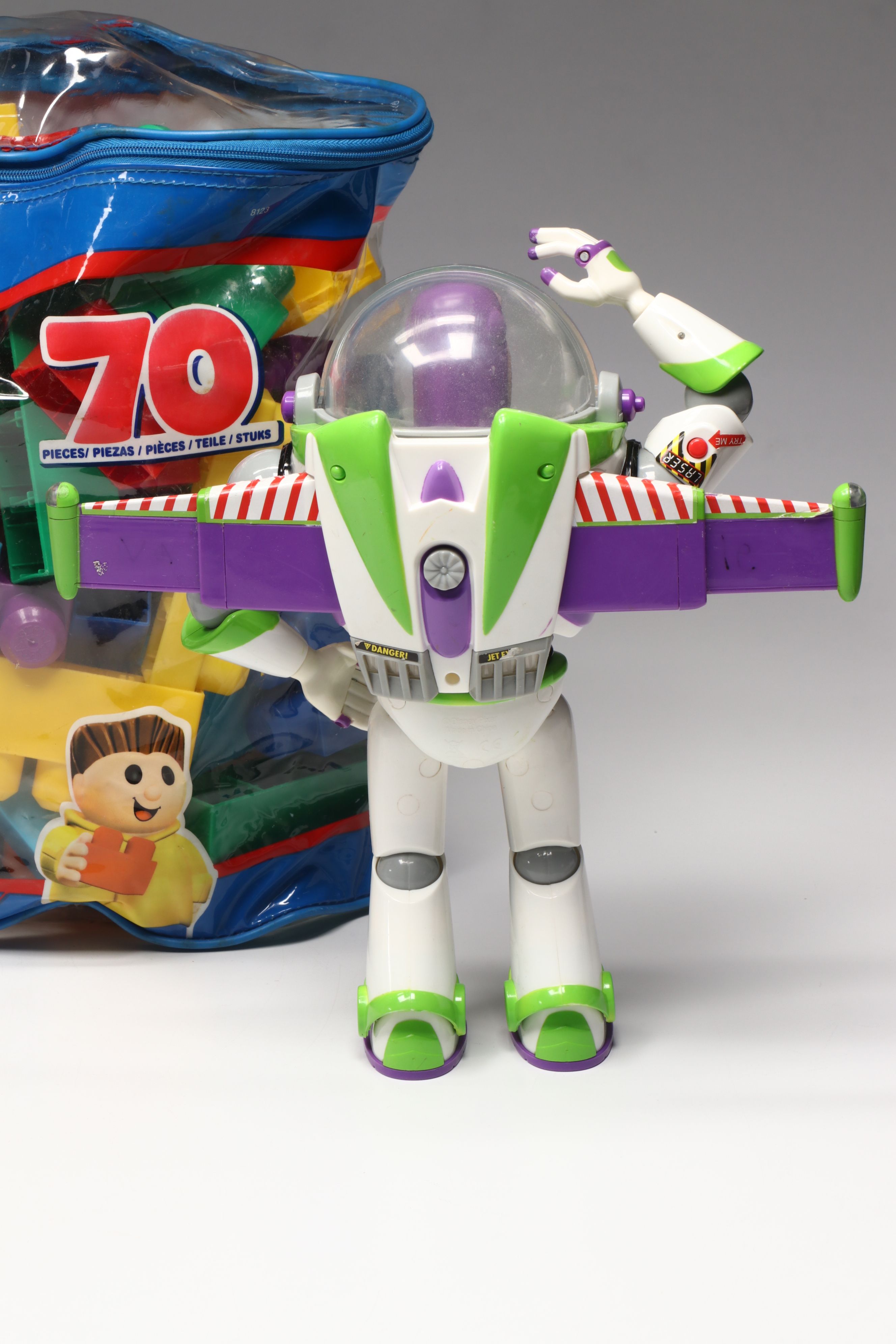 Plush Kermit the Frog, Buzz Lightyear Toys, and Mega Bloks Building Blocks