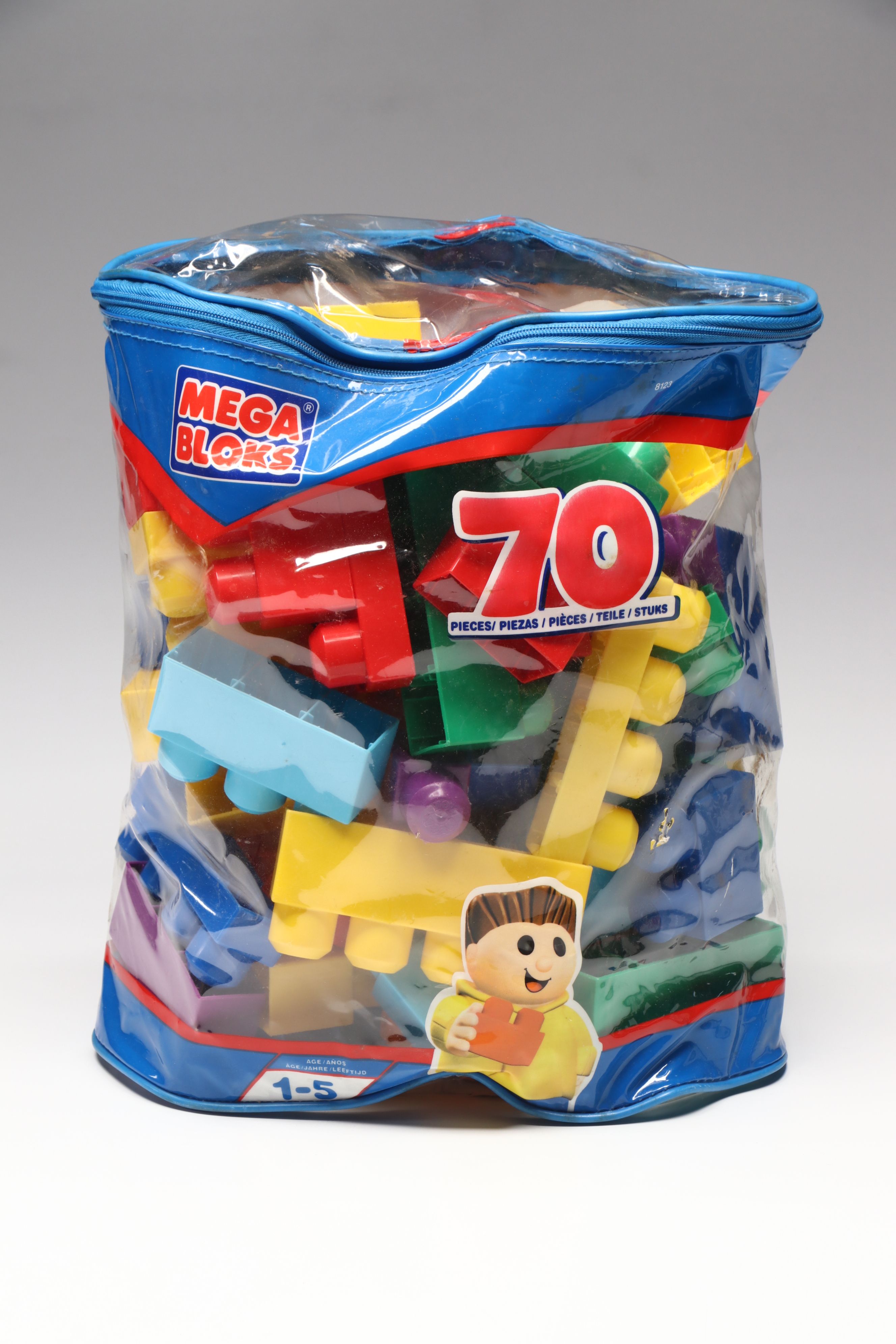 Plush Kermit the Frog, Buzz Lightyear Toys, and Mega Bloks Building Blocks