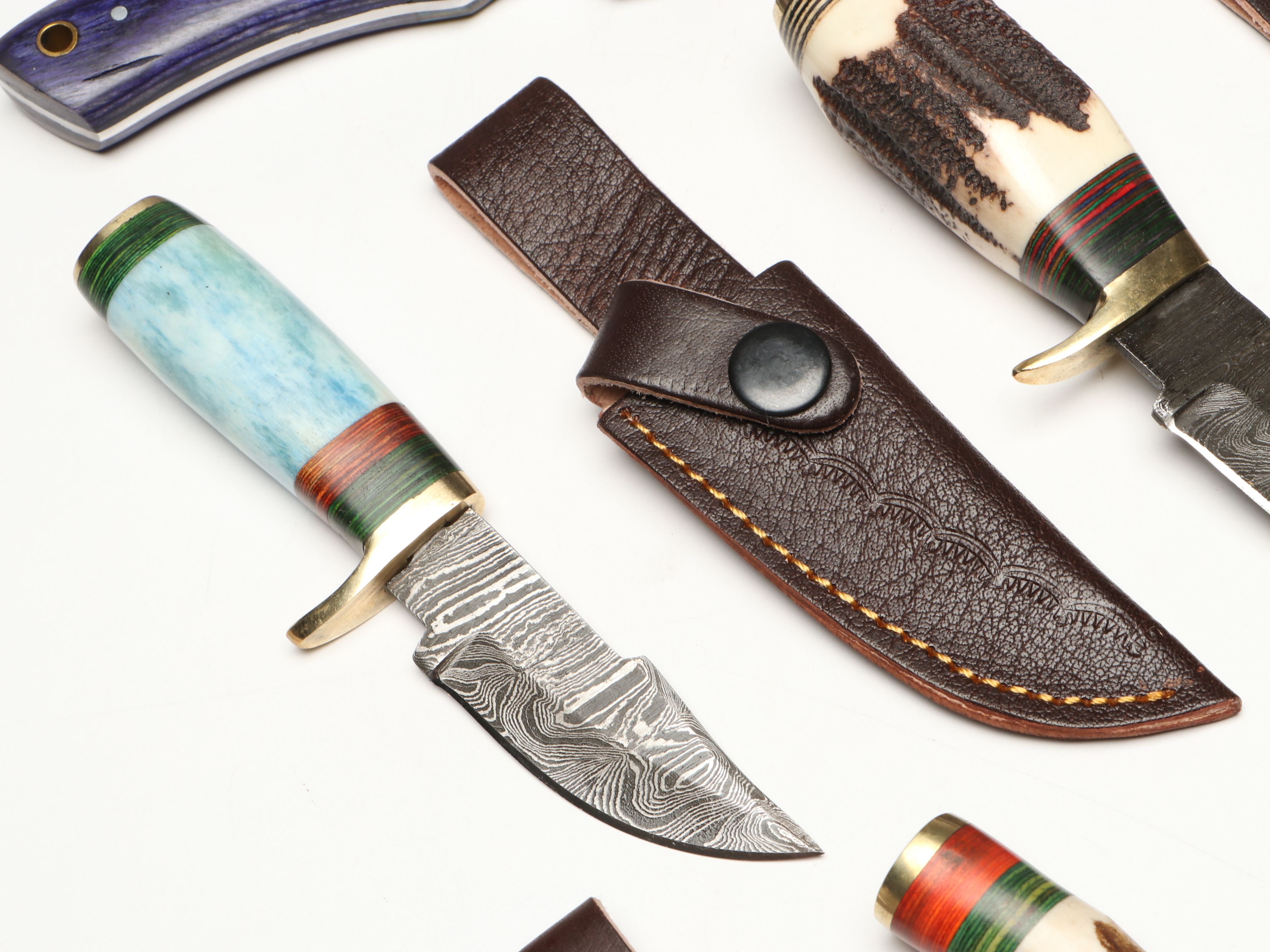 Damascus Steel Skinner and Hunting Knives in Leather Scabbards