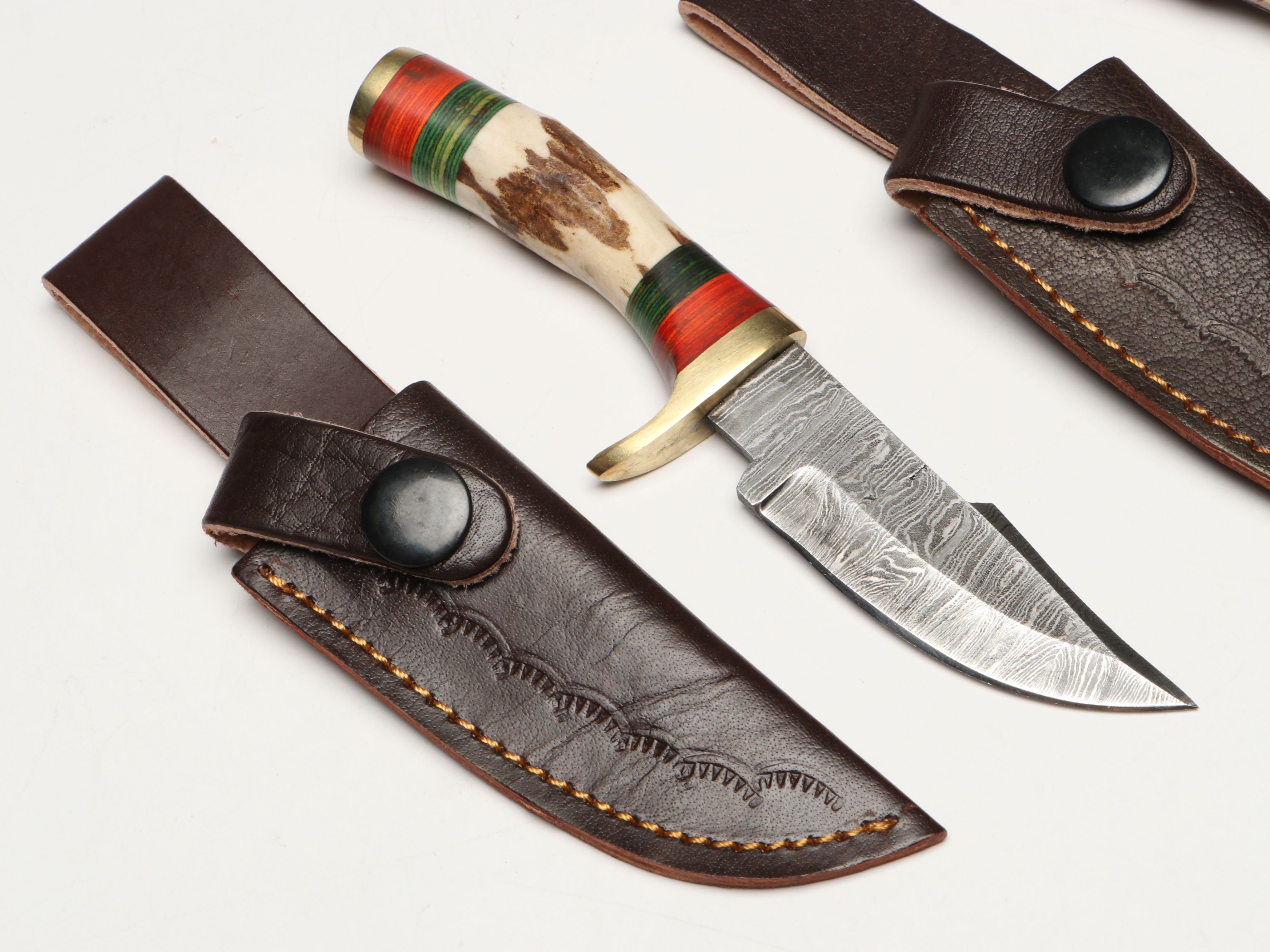 Damascus Steel Skinner and Hunting Knives in Leather Scabbards