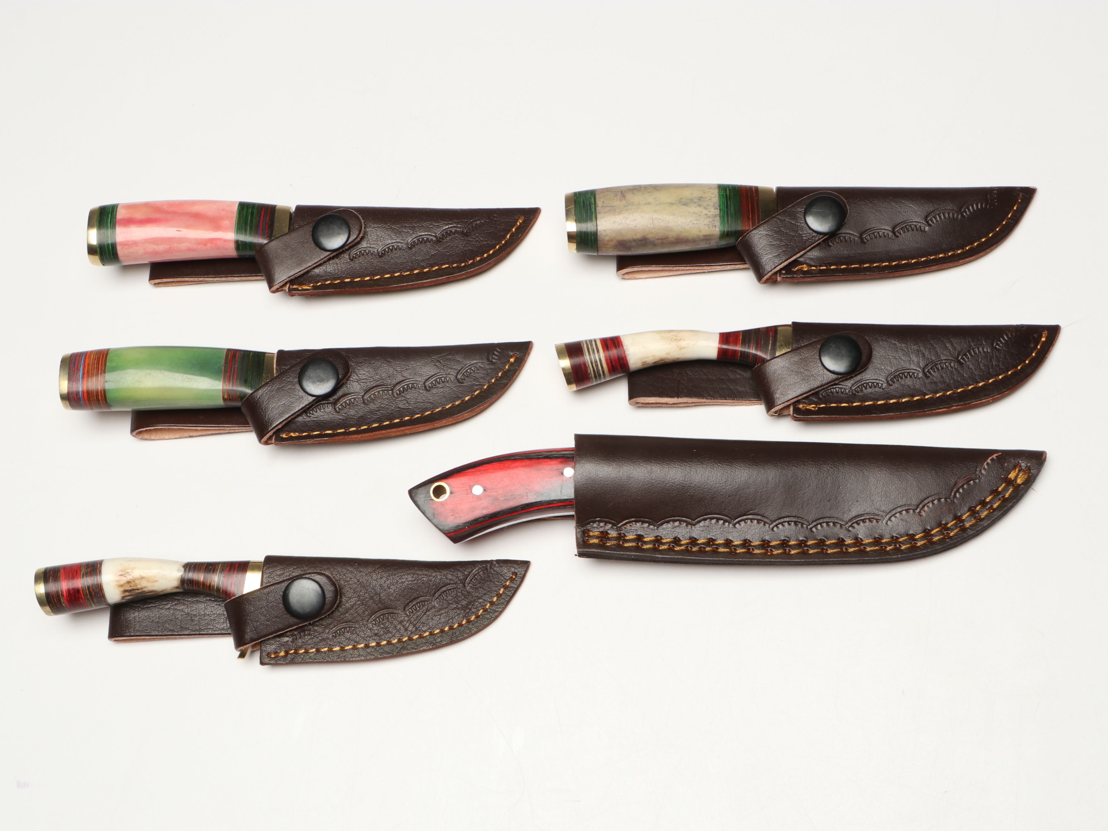 Damascus Steel Skinner and Hunting Knives in Leather Scabbards