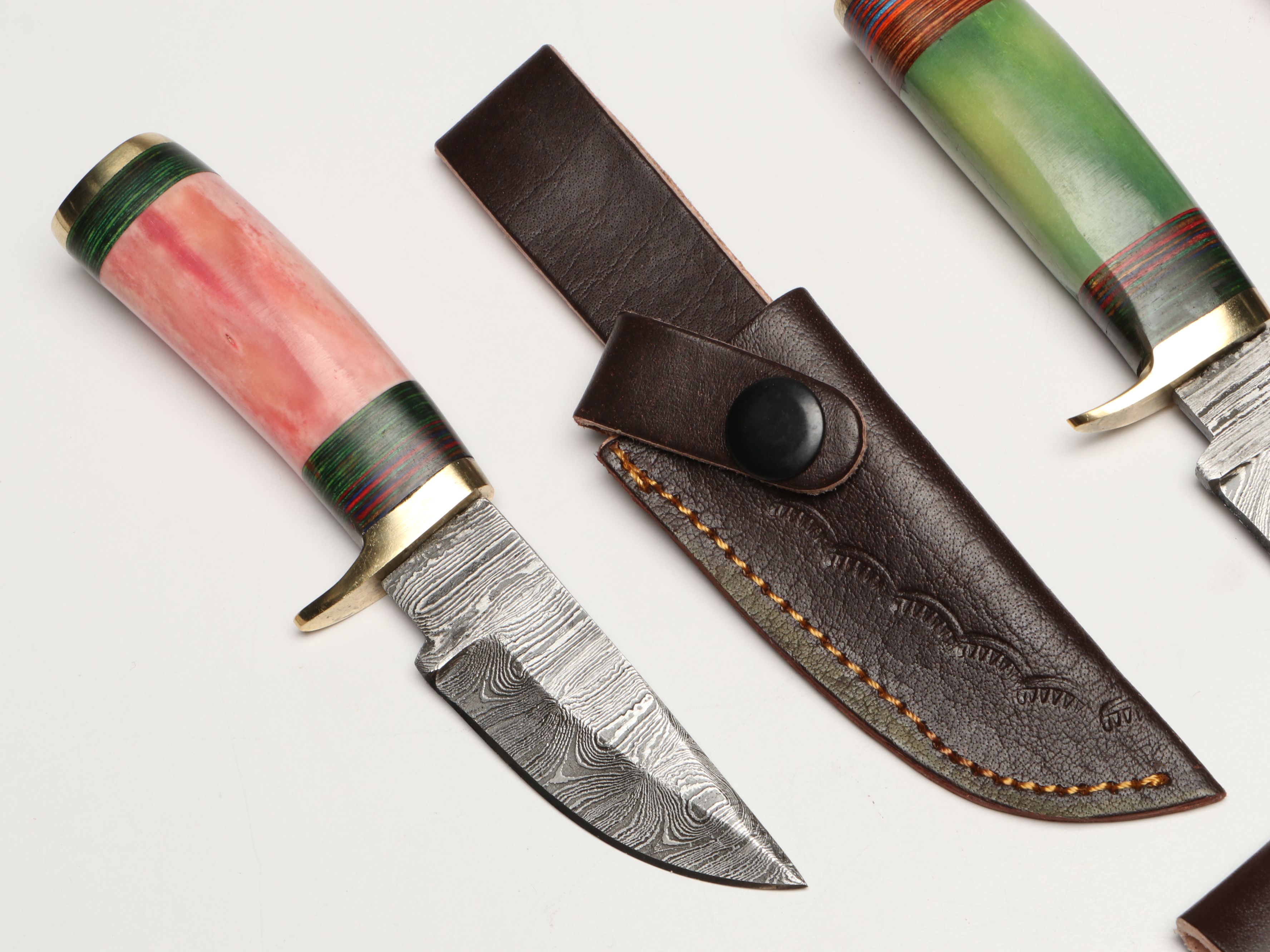 Damascus Steel Skinner and Hunting Knives in Leather Scabbards