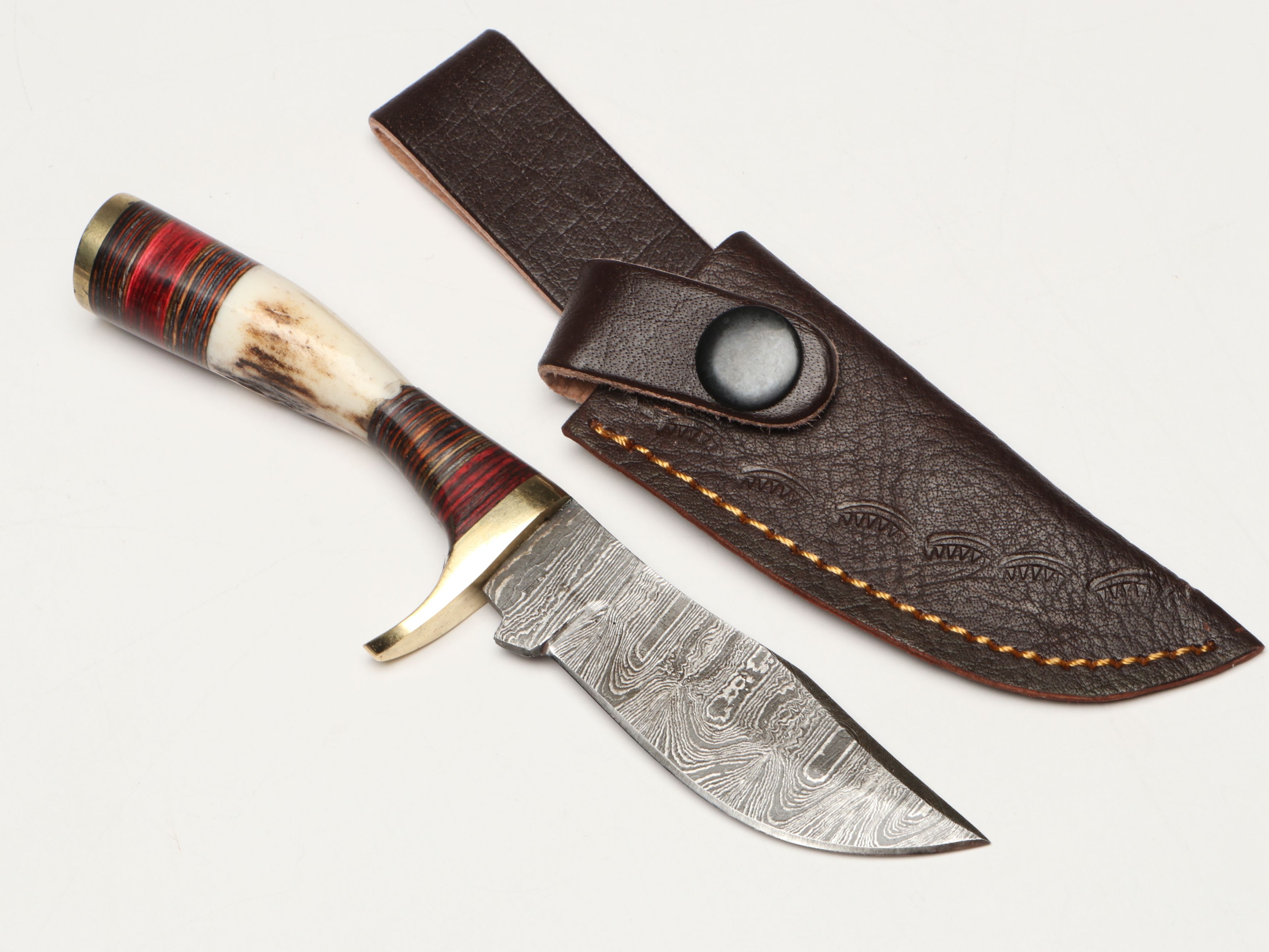 Damascus Steel Skinner and Hunting Knives in Leather Scabbards