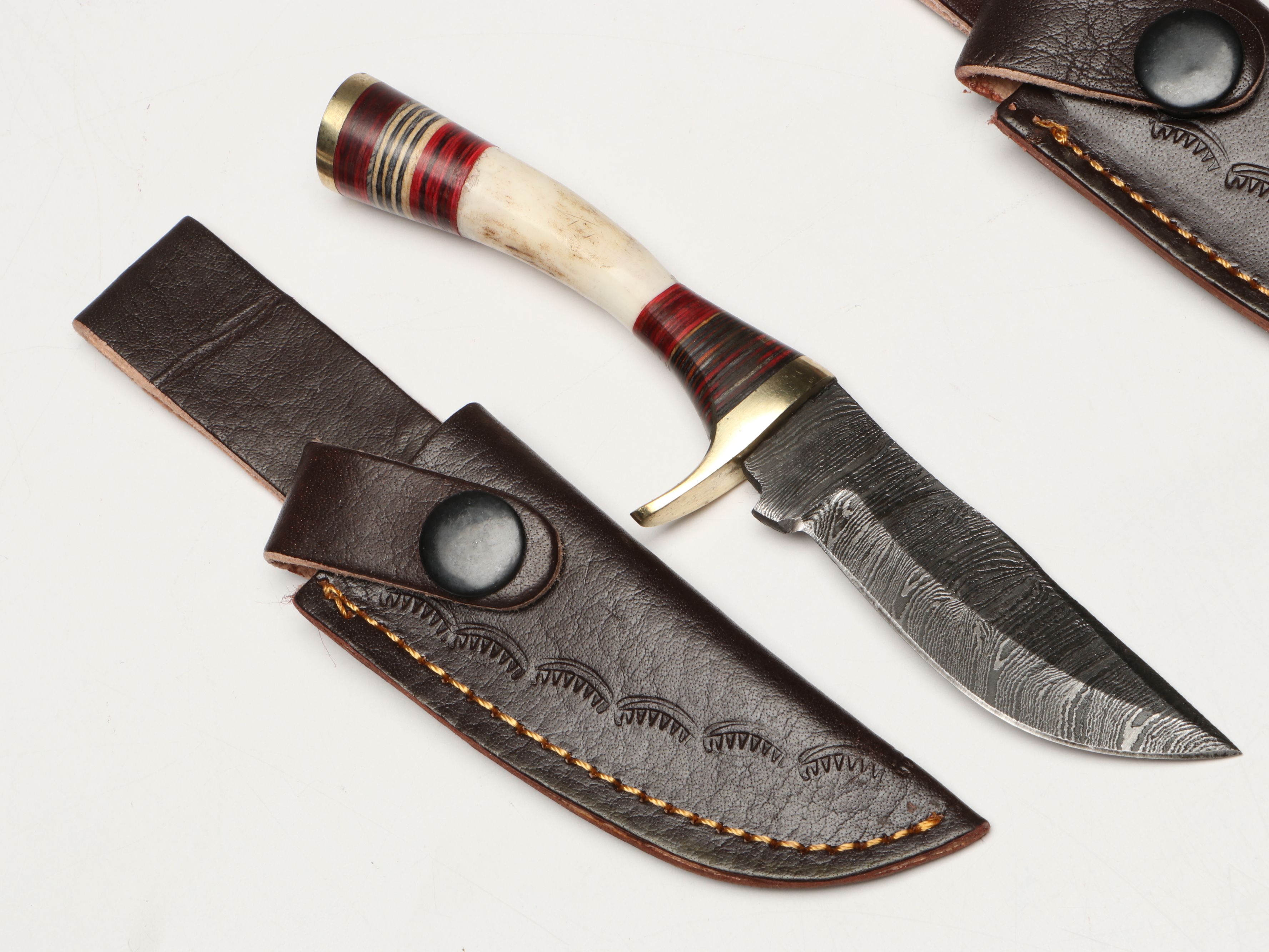 Damascus Steel Skinner and Hunting Knives in Leather Scabbards