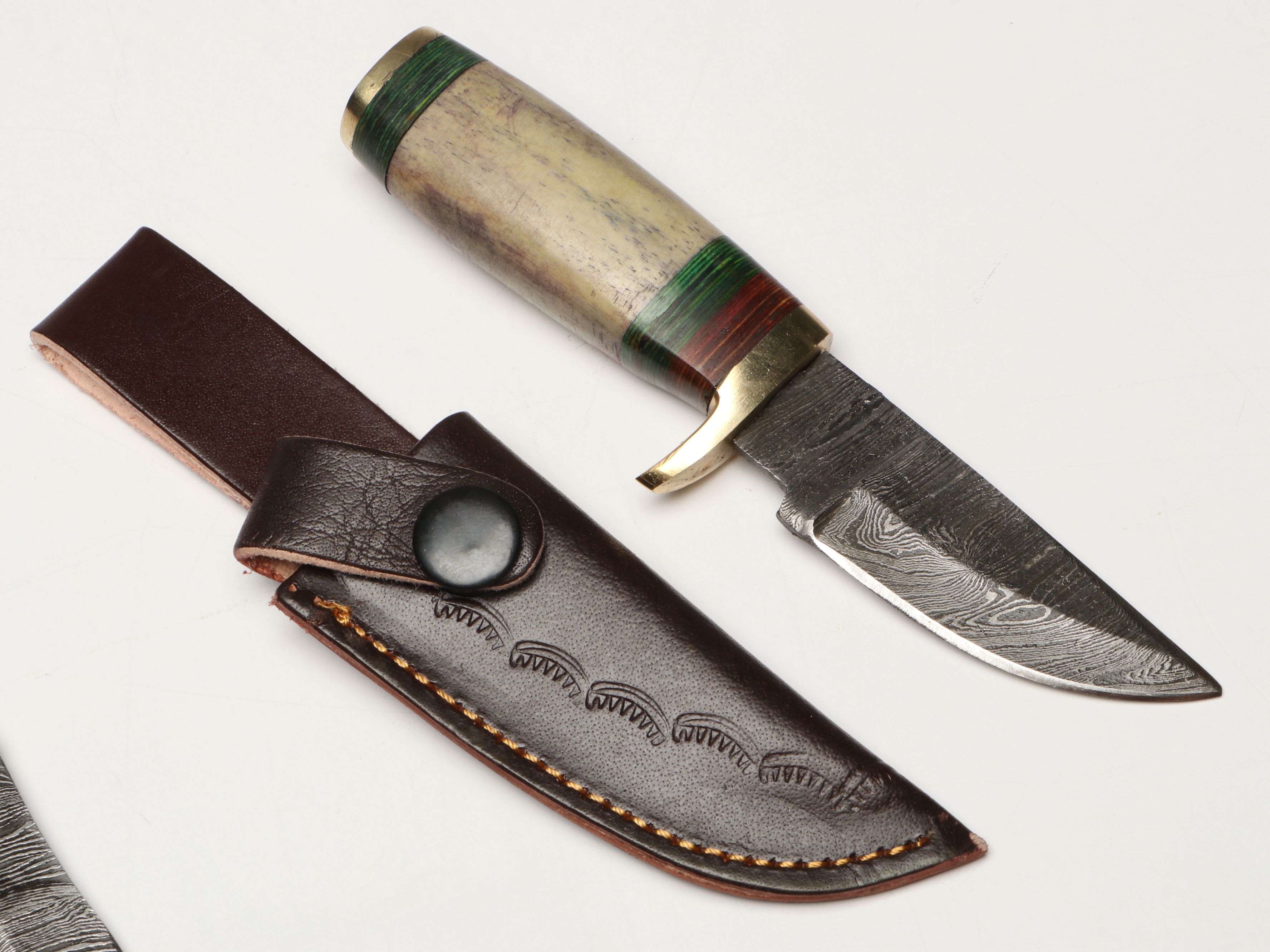 Damascus Steel Skinner and Hunting Knives in Leather Scabbards