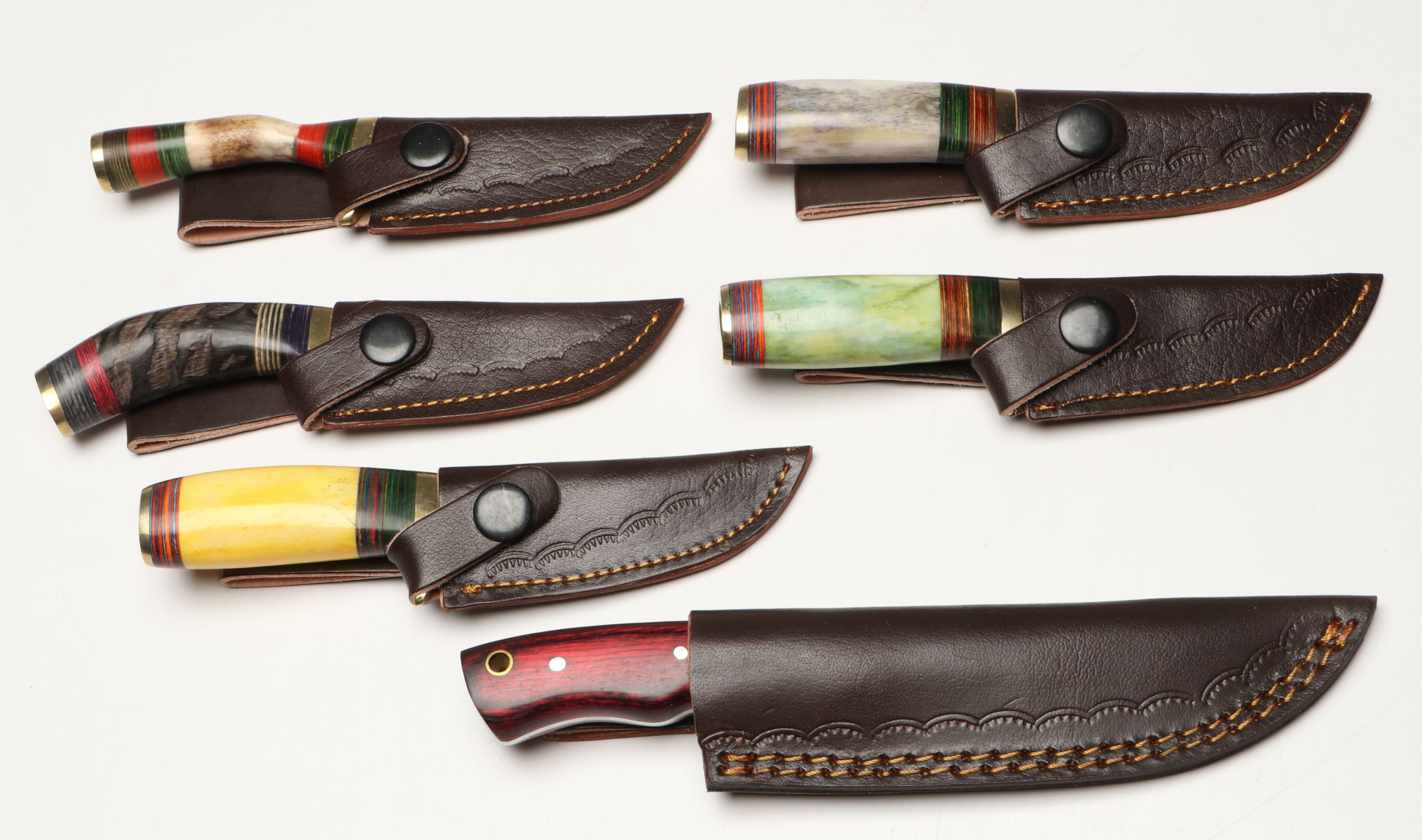 Damascus Steel Skinner and Hunting Knives in Leather Scabbards