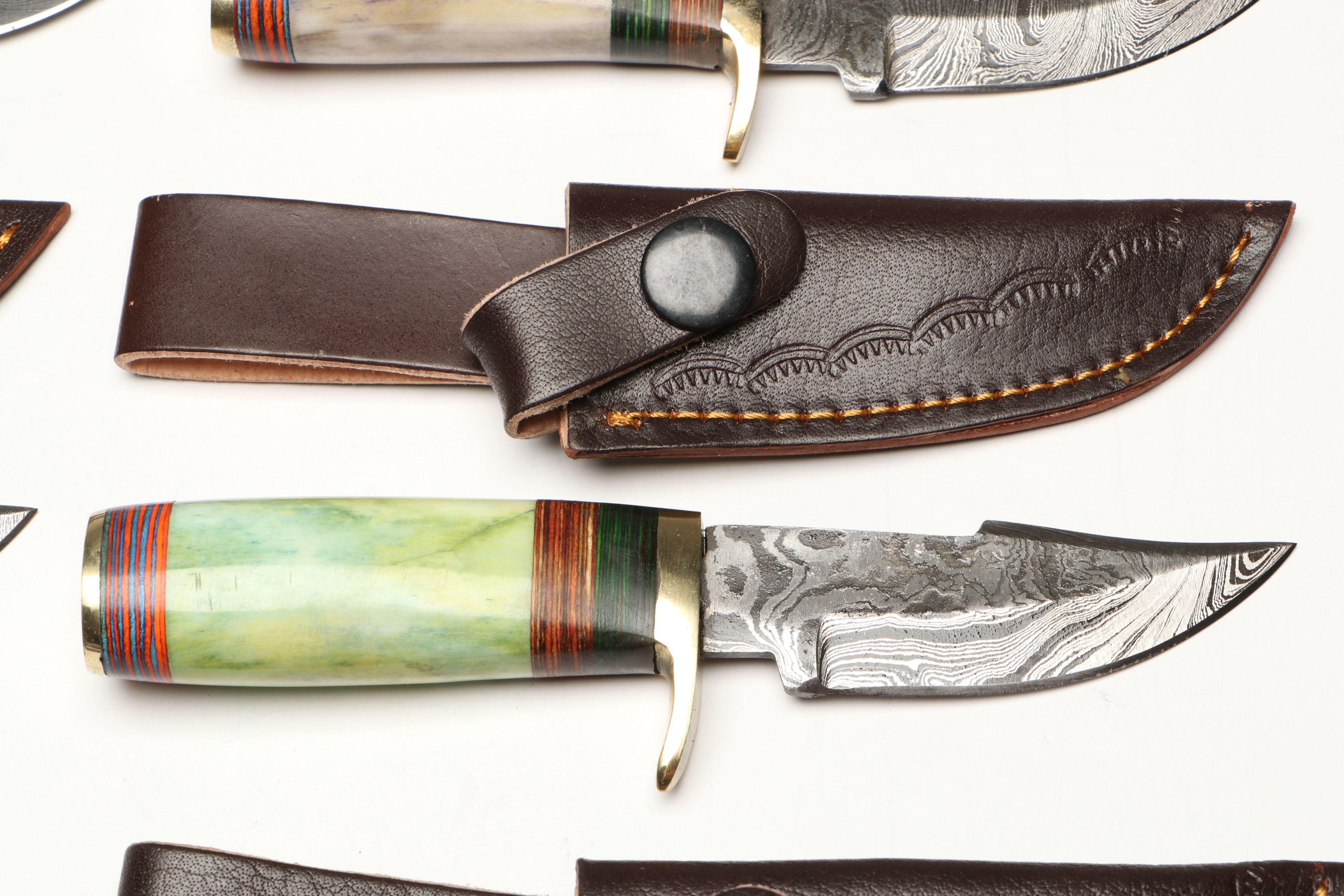 Damascus Steel Skinner and Hunting Knives in Leather Scabbards